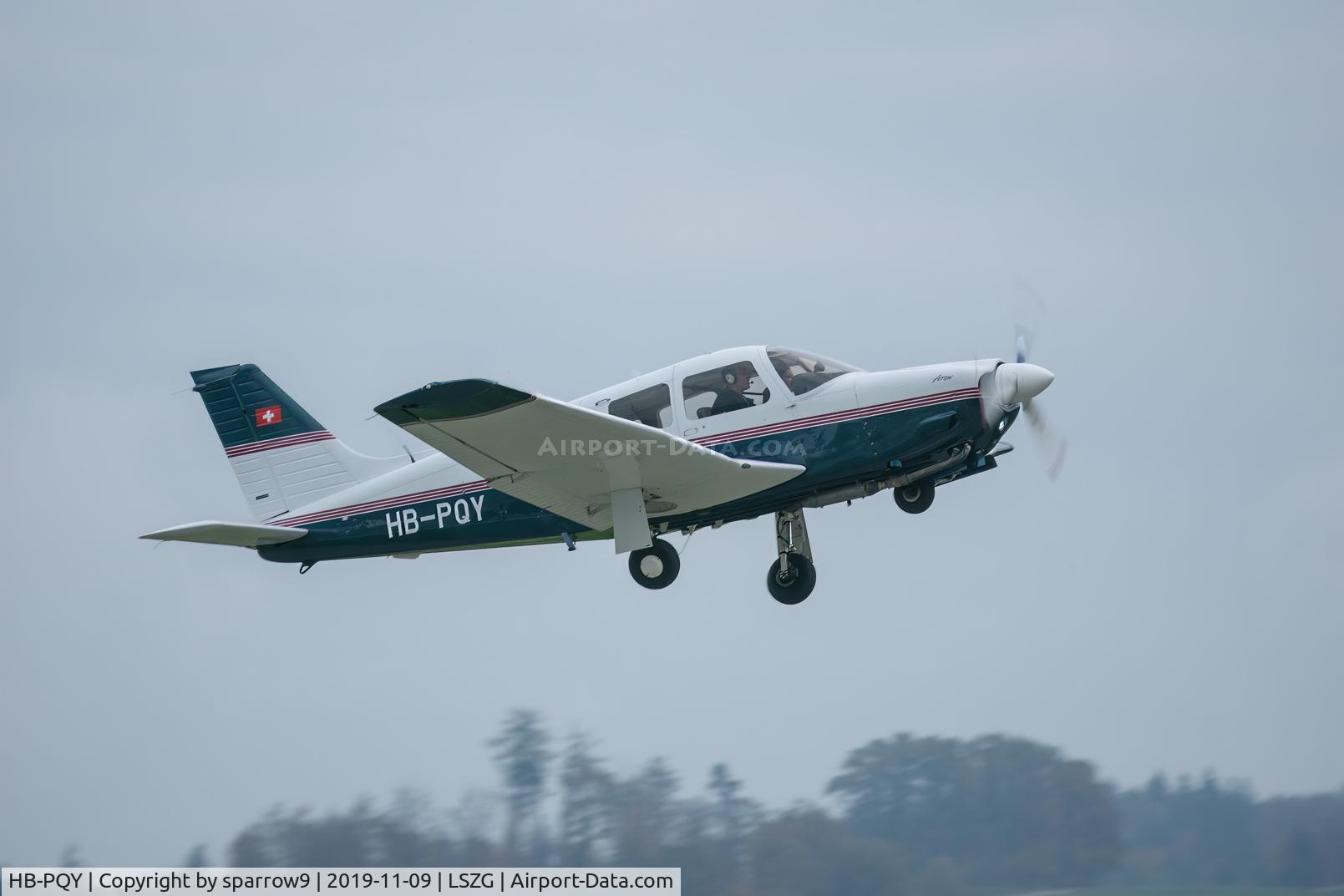 HB-PQY, 2005 Piper PA-28R-201 Cherokee Arrow III C/N 2844120, Climbing out of Grenchen.  HB-registered since 2006-12-28.