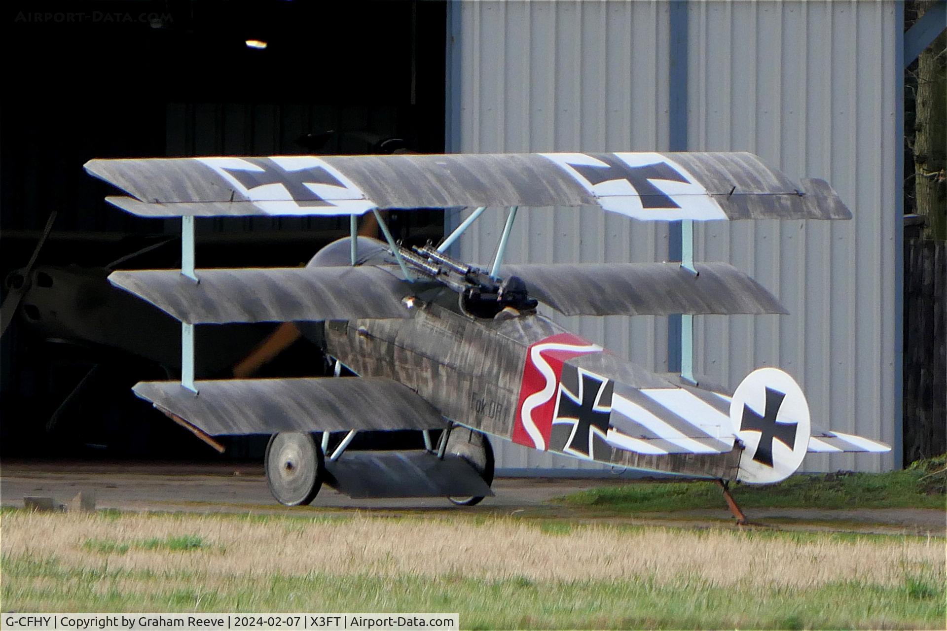 G-CFHY, 2010 Fokker Dr.1 Triplane Replica C/N PFA 238-14408, Just landed at Felthorpe.