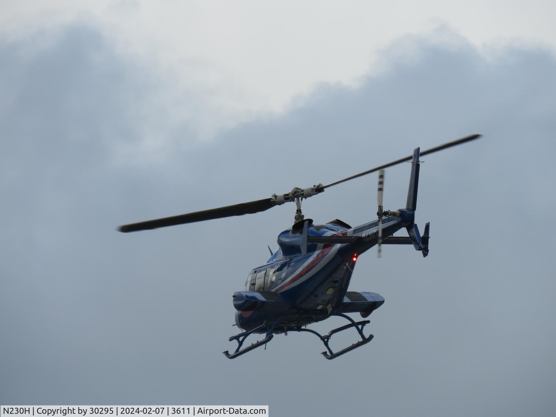 N230H, 1994 Bell 230 C/N 23019, Headed into the clouds