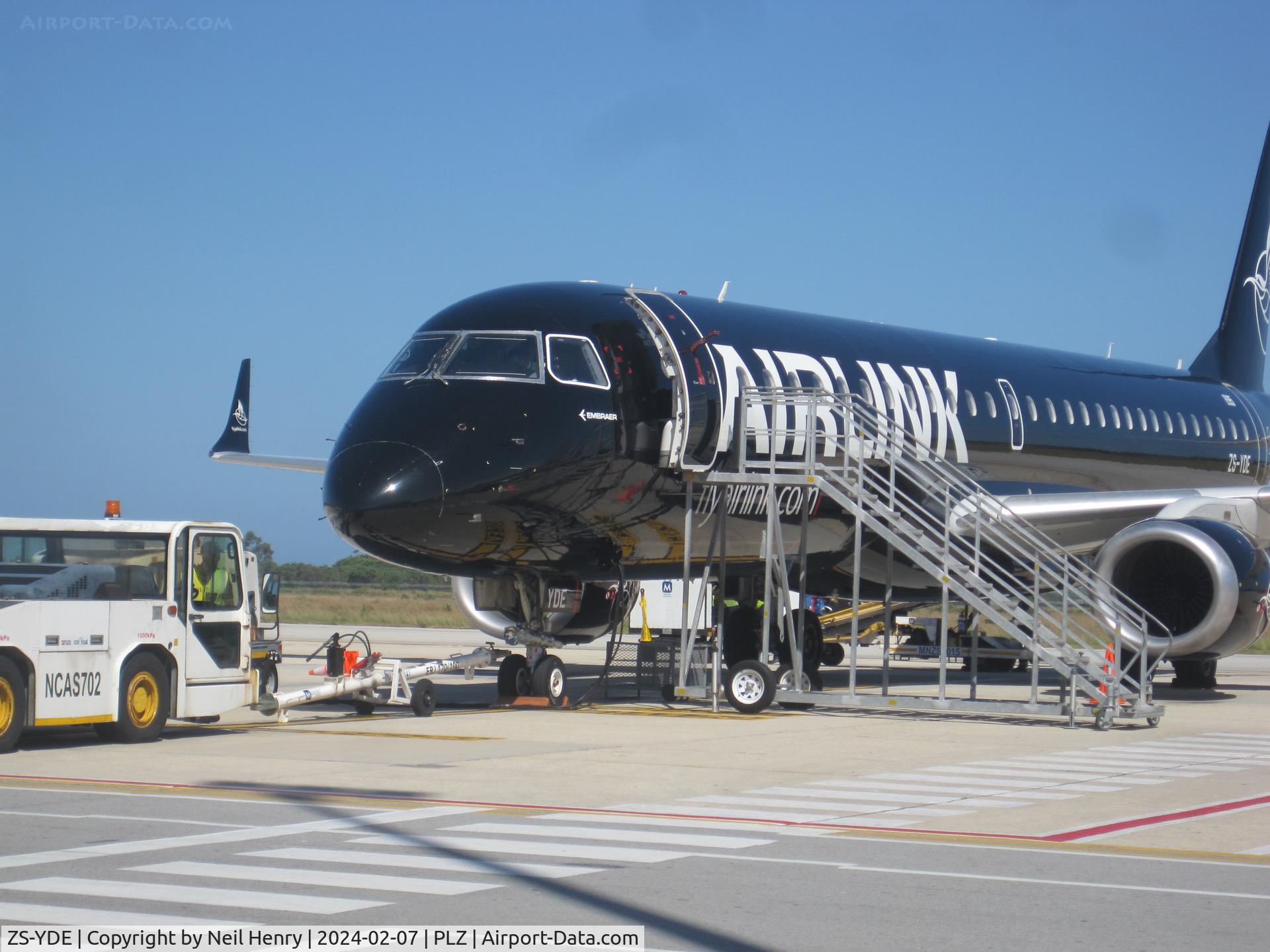 ZS-YDE, 2007 Embraer 195LR (ERJ-190-200LR) C/N 19000088, Seen at Port Elizabeth prior to boarding on 07 February 2024.
Noted that black livery is not the usual for for SA Airlink.  Also inside, notices were in Russian (?) with smaller English version below.  Catering cart had a Brazilian airline label.