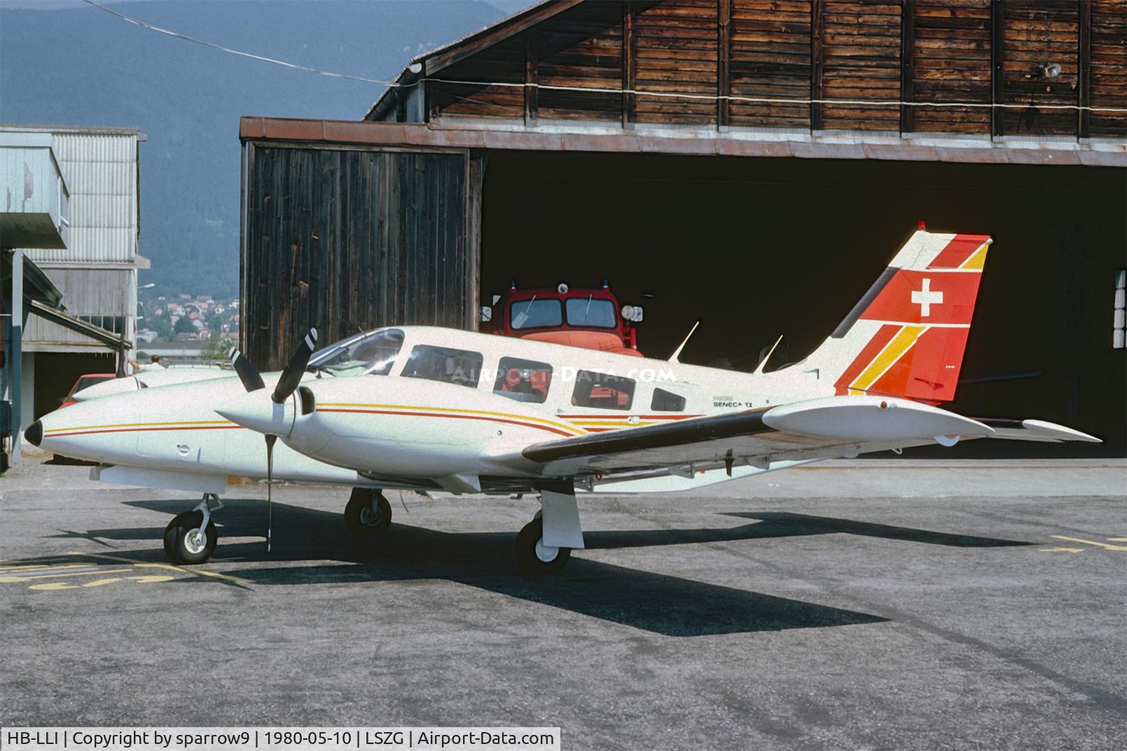HB-LLI, 1979 Piper PA-34-200T C/N 34-7970332, At Grenchen. The old hangar. HB-registered from 1979-06-26 until 1997-12-31. Scanned from a slide.