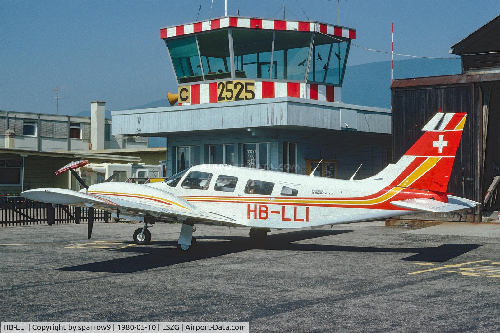 HB-LLI, 1979 Piper PA-34-200T C/N 34-7970332, At Grenchen. The old building and tower. HB-registered from 1979-06-26 until 1997-12-31. Scanned from a slide.