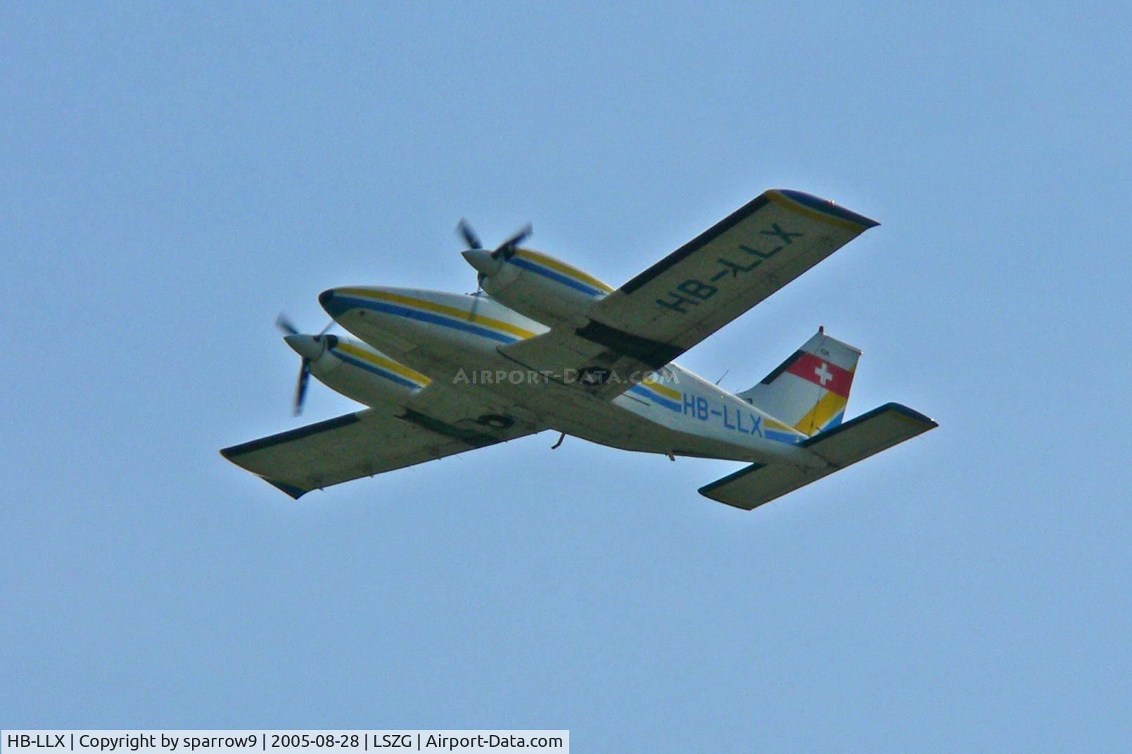 HB-LLX, 1980 Piper PA-34-200T Seneca II C/N 34-8070232, On a low go-around at Grenchen. HB-registered from 1980-05-21 until 2010-08-26. Scanned from a slide.