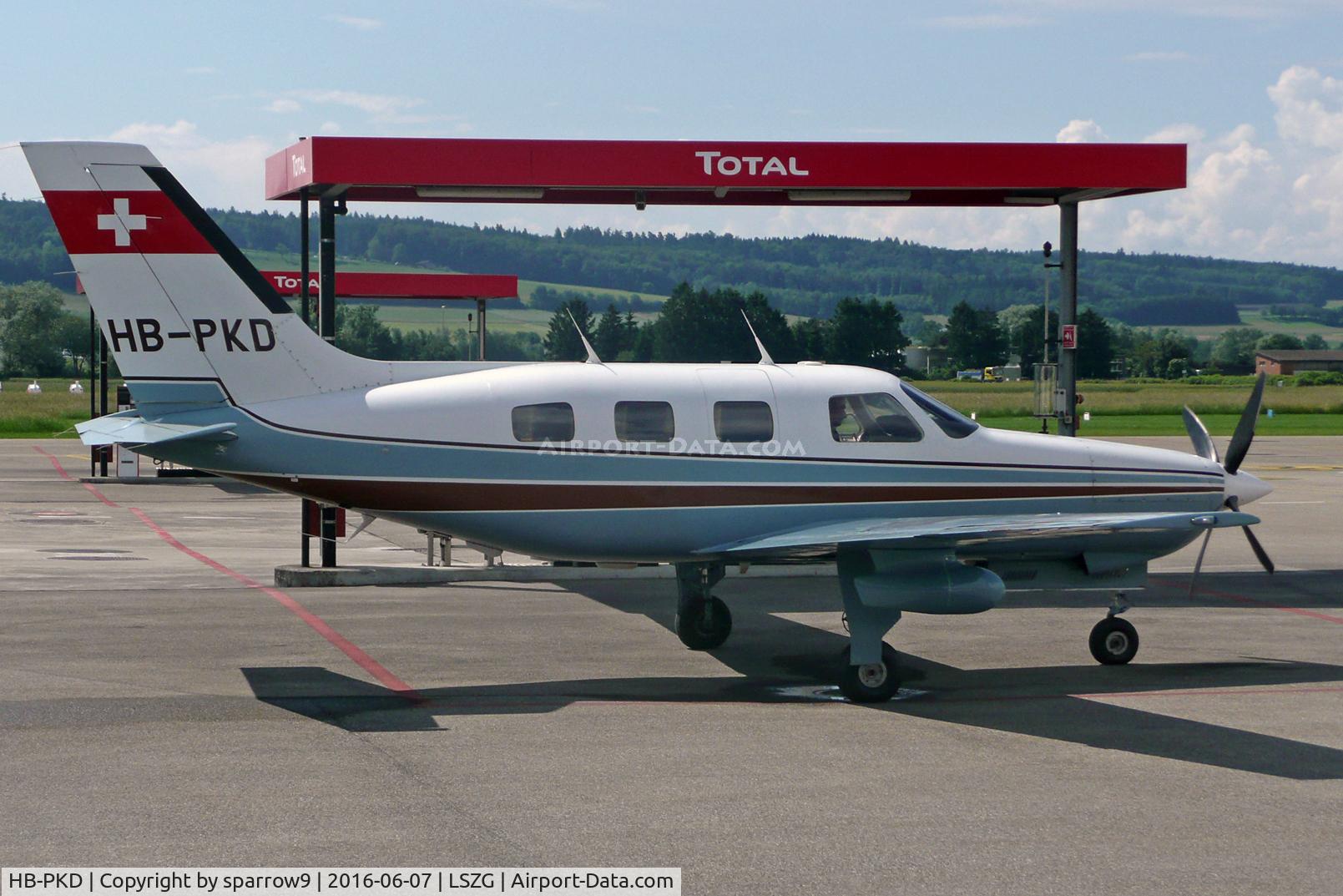HB-PKD, 1986 Piper PA-46-310P Malibu C/N 46-8608028, Refuelling at Grenchen. HB-registered since 1986-08-11.