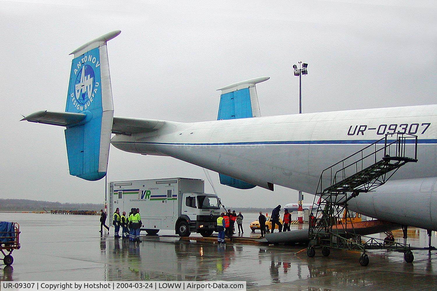 UR-09307, 1974 Antonov An-22A C/N 043481244, Van being loaded on-board