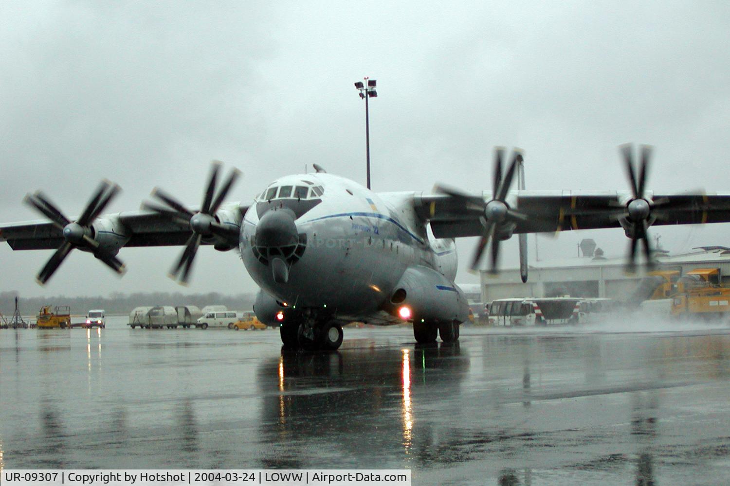 UR-09307, 1974 Antonov An-22A C/N 043481244, On its way to the runway kicking up spray