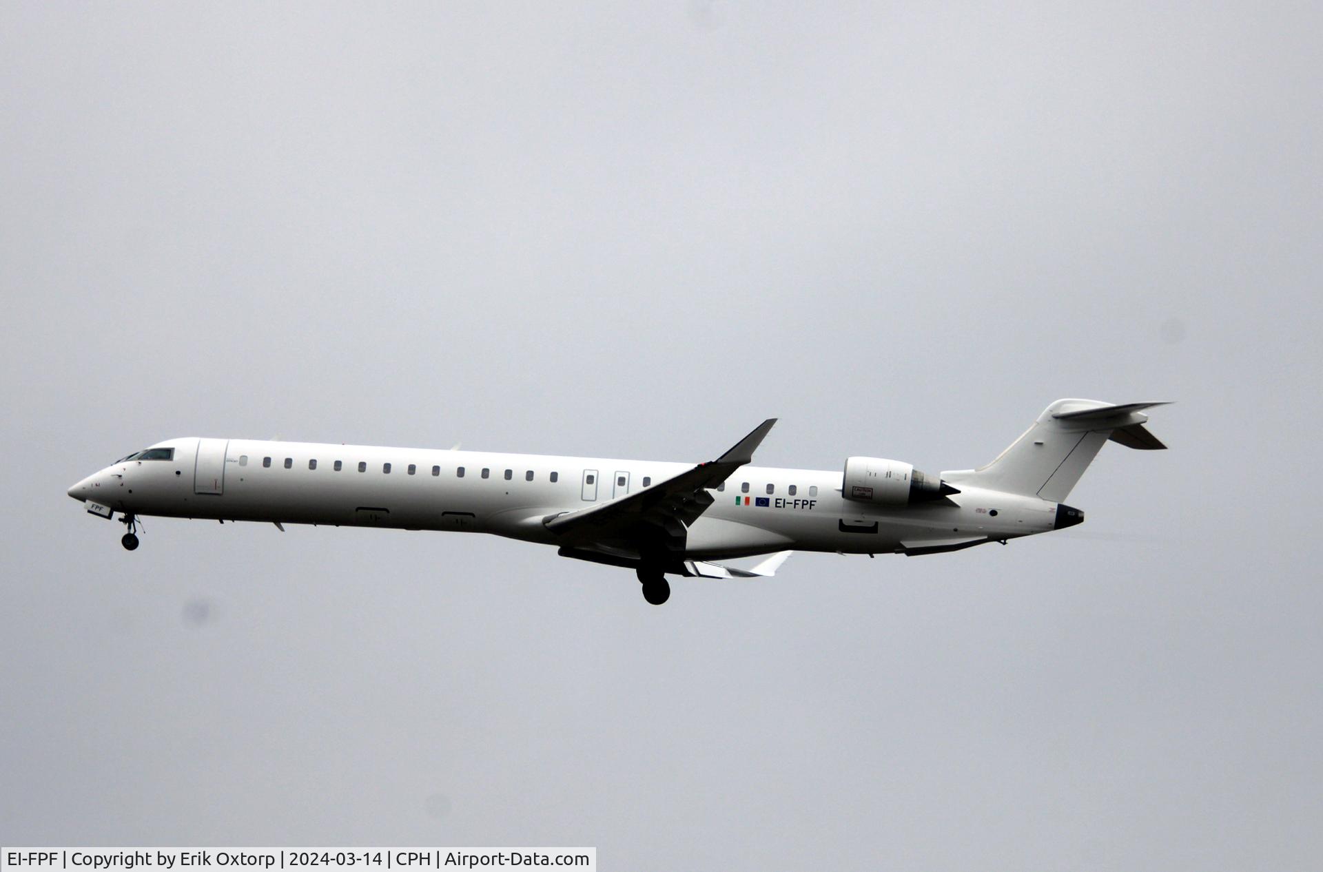 EI-FPF, 2016 Bombardier CRJ-900LR (CL-600-2D24) C/N 15403, EI-FPF landing rw 22L.    Now all white