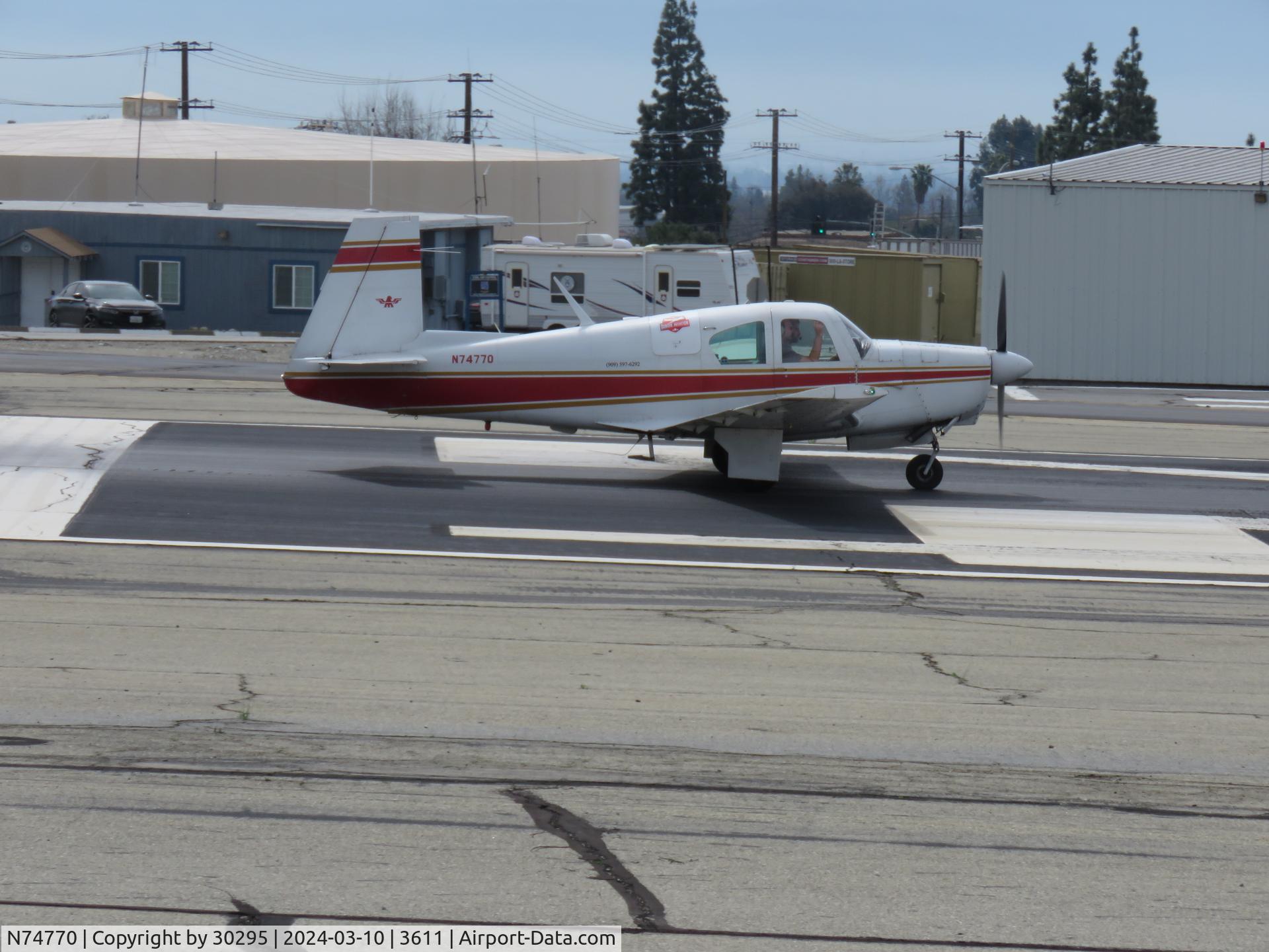 N74770, 1961 Mooney M20B Mark 21 C/N 1770, Taking off