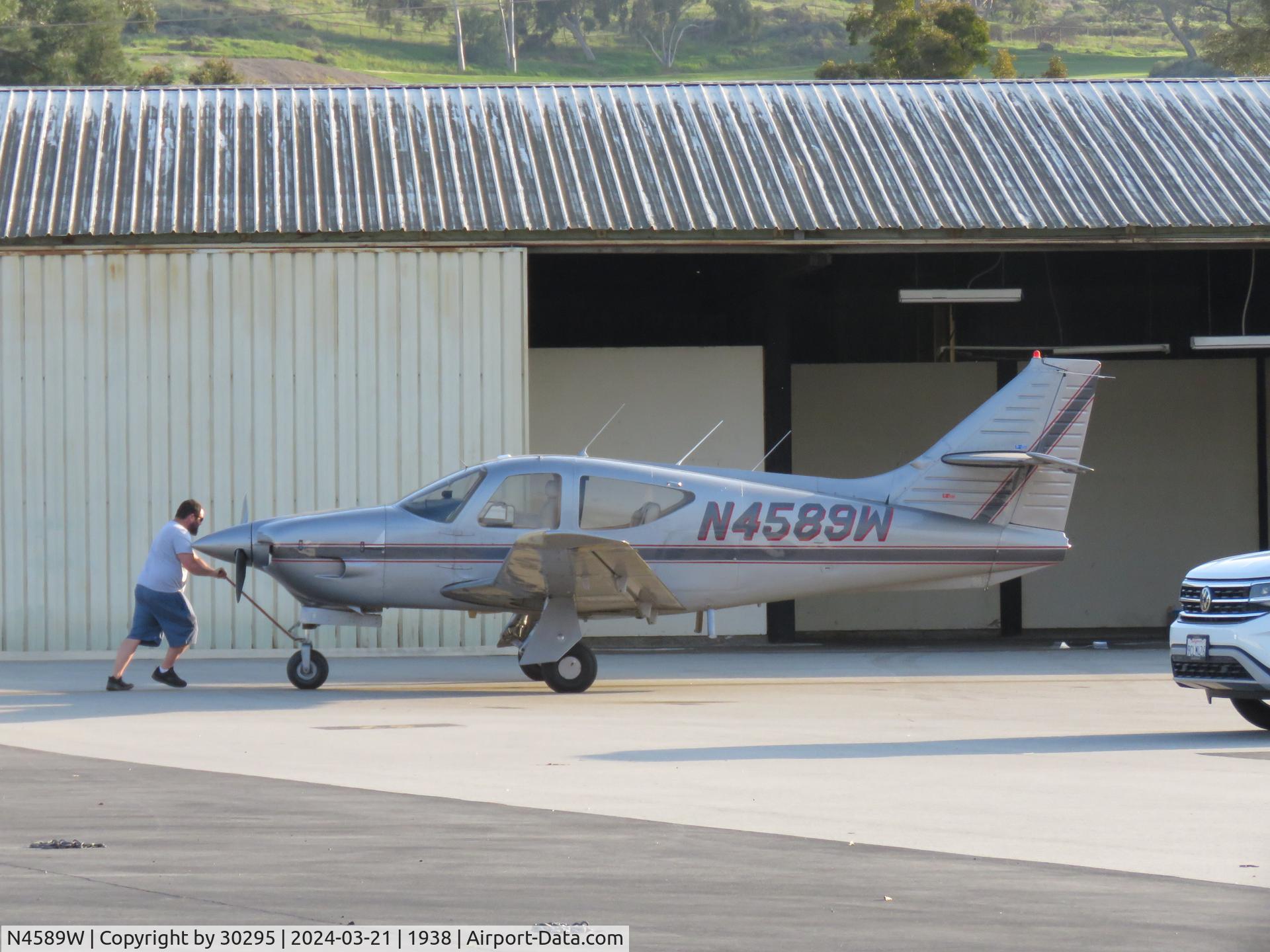 N4589W, 1976 Rockwell International 112TC Commander C/N 13079, Pushing into hanger