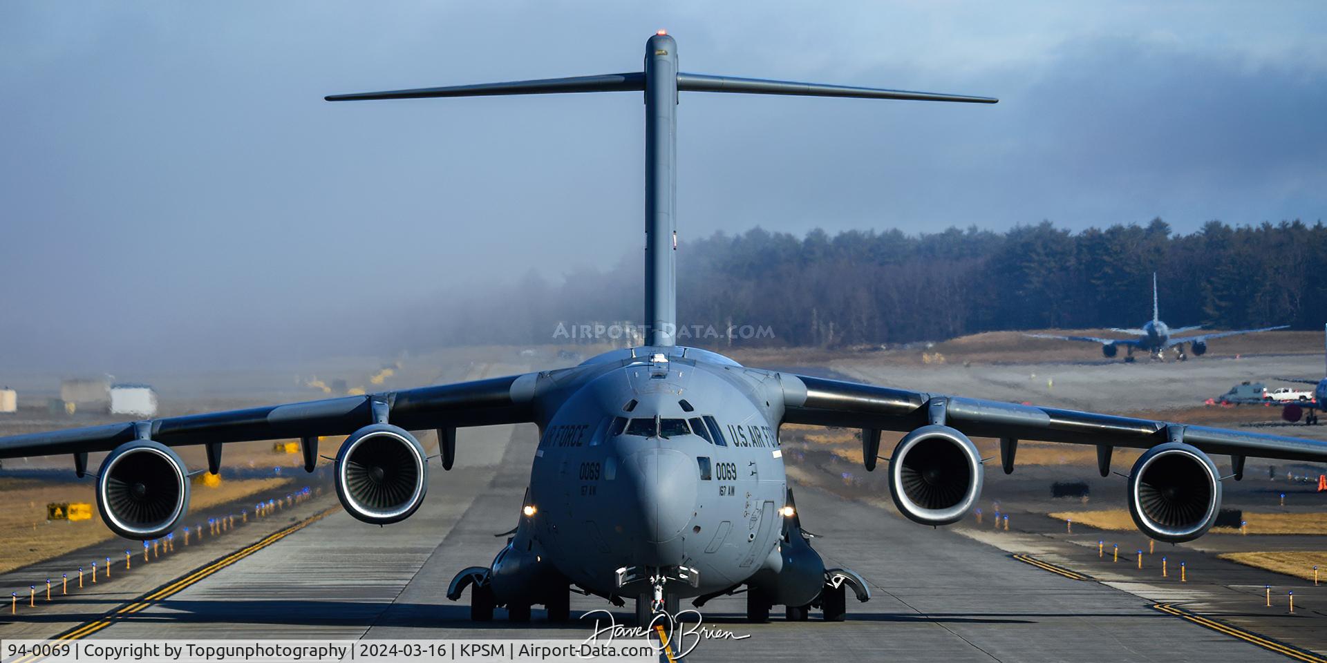94-0069, 1994 McDonnell Douglas C-17A Globemaster III C/N 50029/F-28, REACH553 loaded up with 2 Blackhawks from the NH ARNG