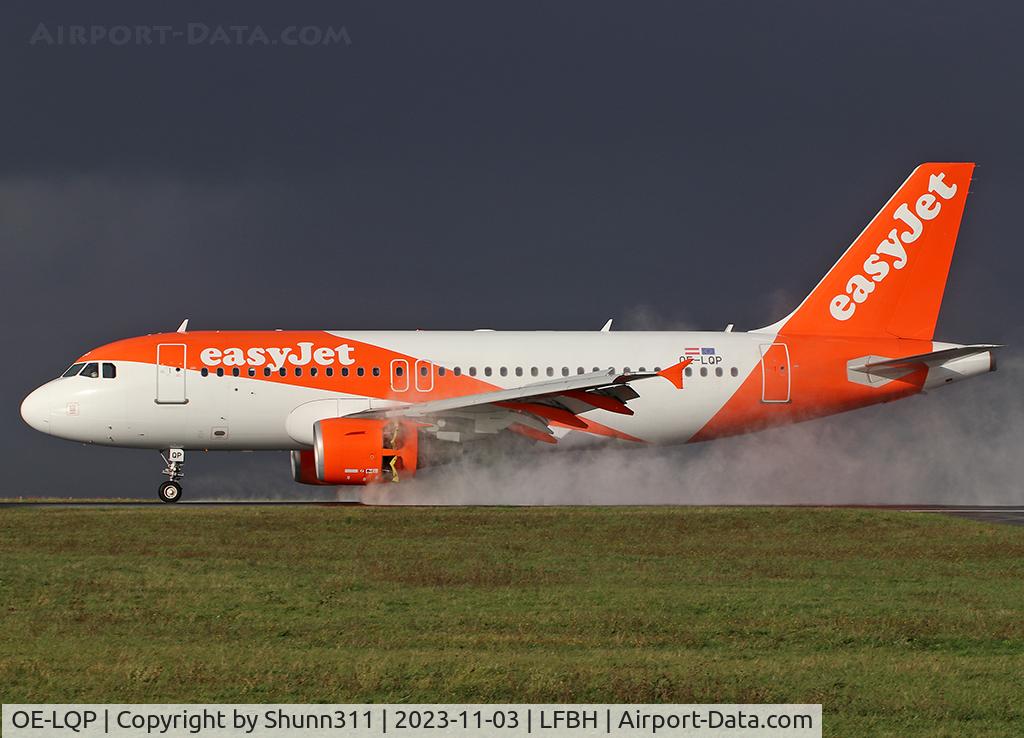 OE-LQP, 2009 Airbus A319-111 C/N 3810, Landing rwy 27 after heavy rain...