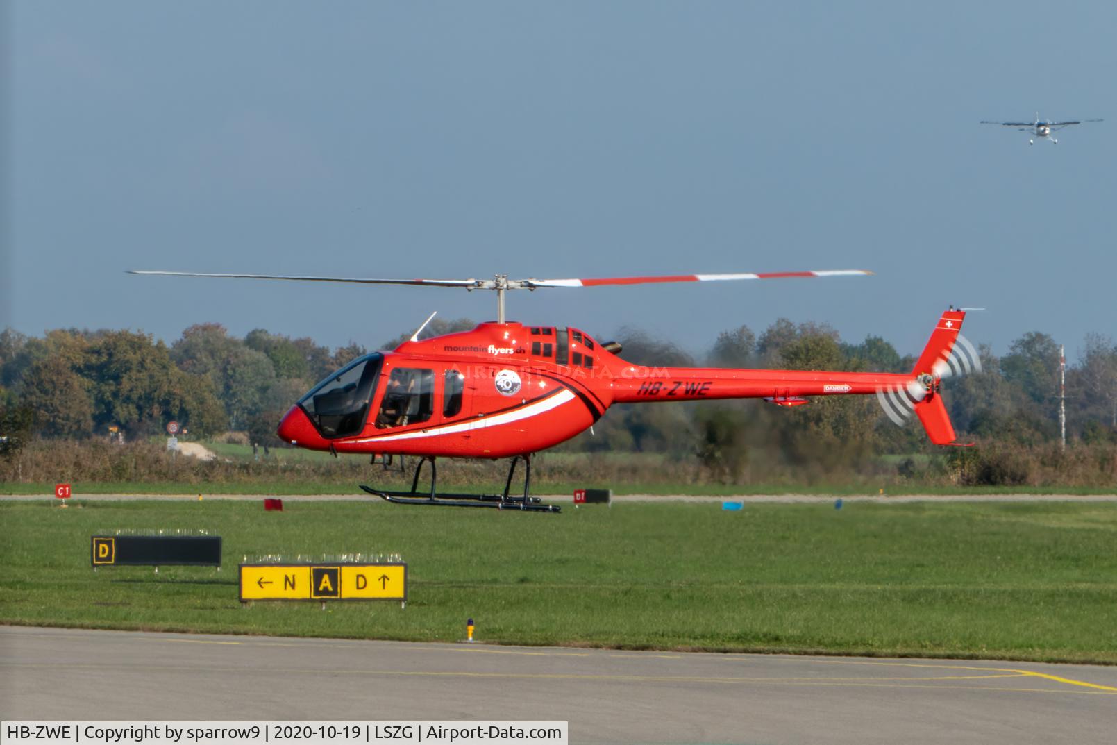 HB-ZWE, 2020 Bell 505 Jet Ranger X C/N 65288, Hoovering to parking at Grenchen.