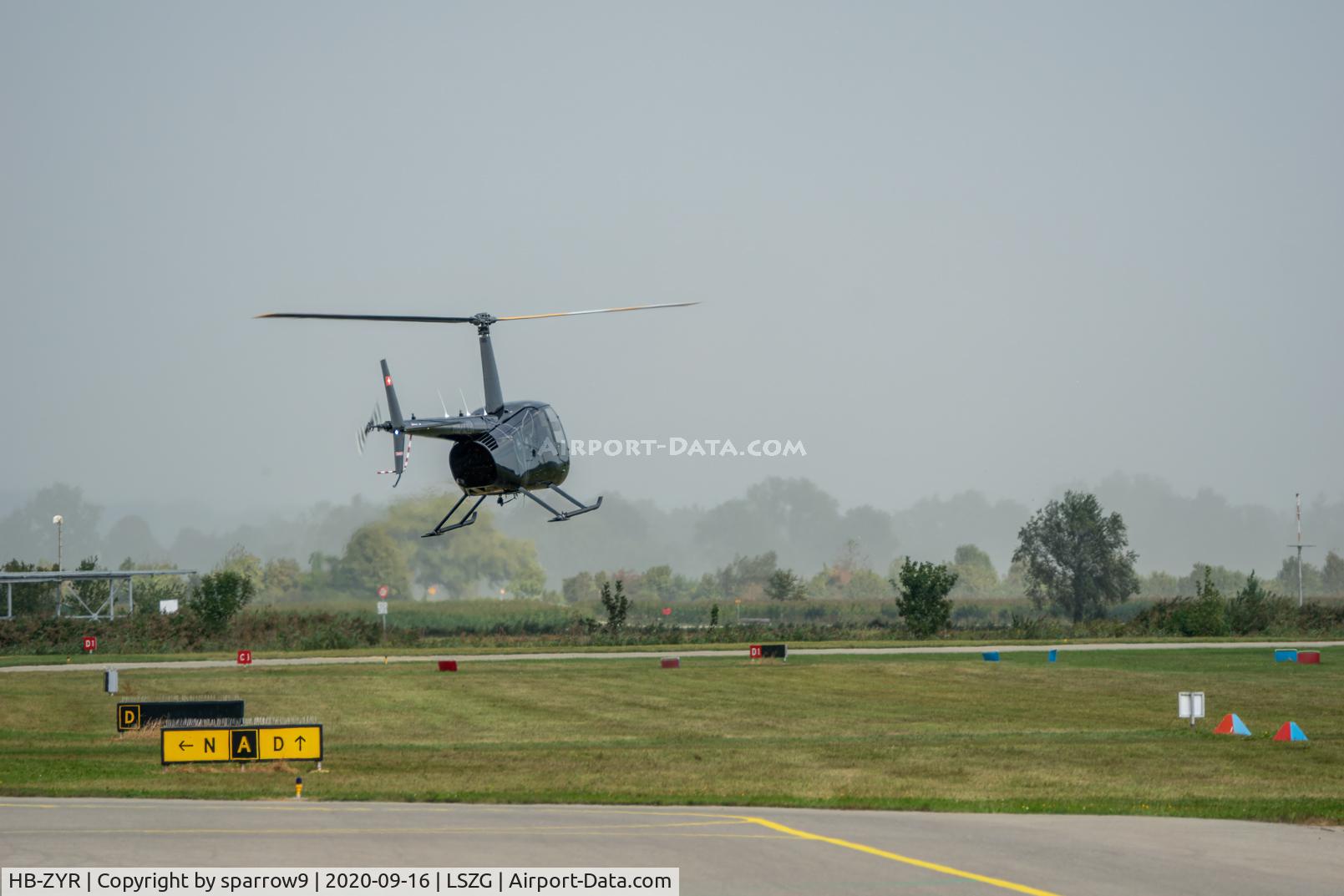 HB-ZYR, 2020 Robinson R-44 Cadet C/N 30065, Departing to the east from Grenchen