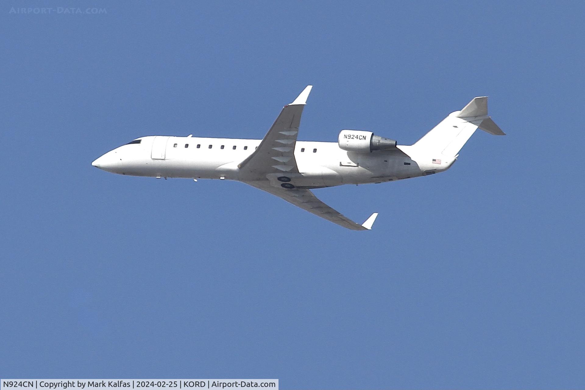 N924CN, 2001 Canadair CRJ-200LR (CL-600-2B19) C/N 7494, CRJ2 Contour Airlines/ Corporate Flight Management BOMBARDIER INC CL-600-2B19 N924CN departing 28C KORD