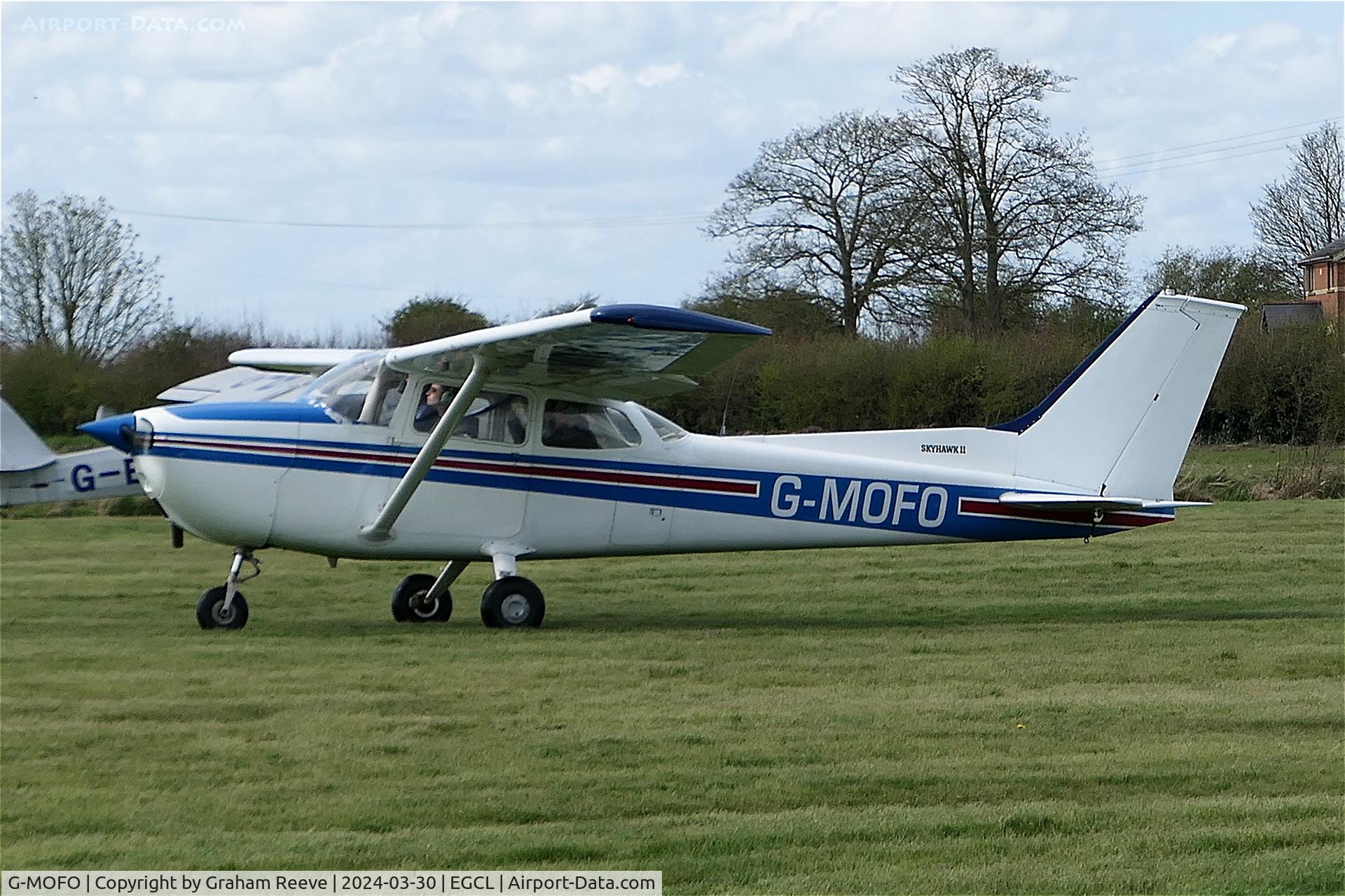 G-MOFO, 1974 Reims Cessna F172M Skyhawk C/N 1192, Departing from Fenland.