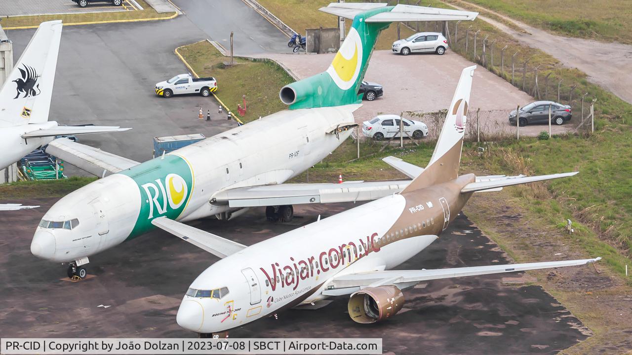 PR-CID, 1991 Boeing 737-33A C/N 25033, Stored at SBCT alogside with B727-200F PR-IOF.