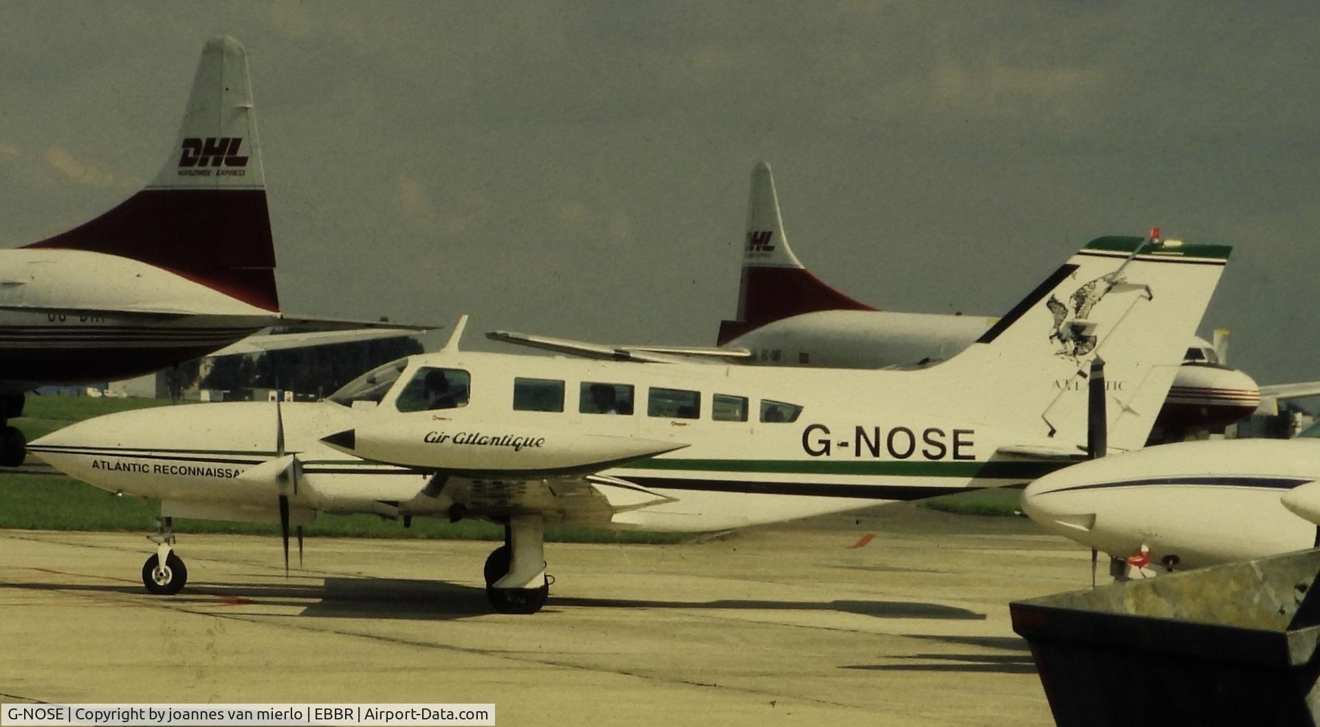 G-NOSE, 1975 Cessna 402B Utililiner C/N 402B-0823, ex-slide