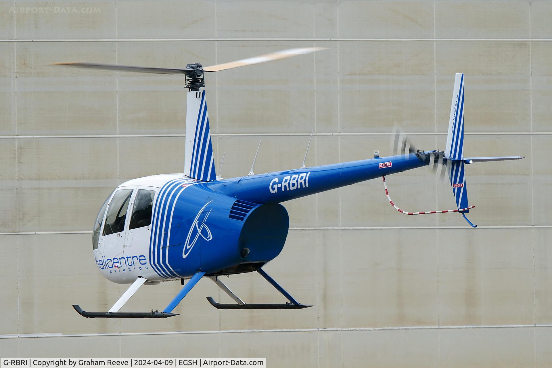 G-RBRI, 2007 Robinson R44 Raven II C/N 11963, Landing at Norwich.