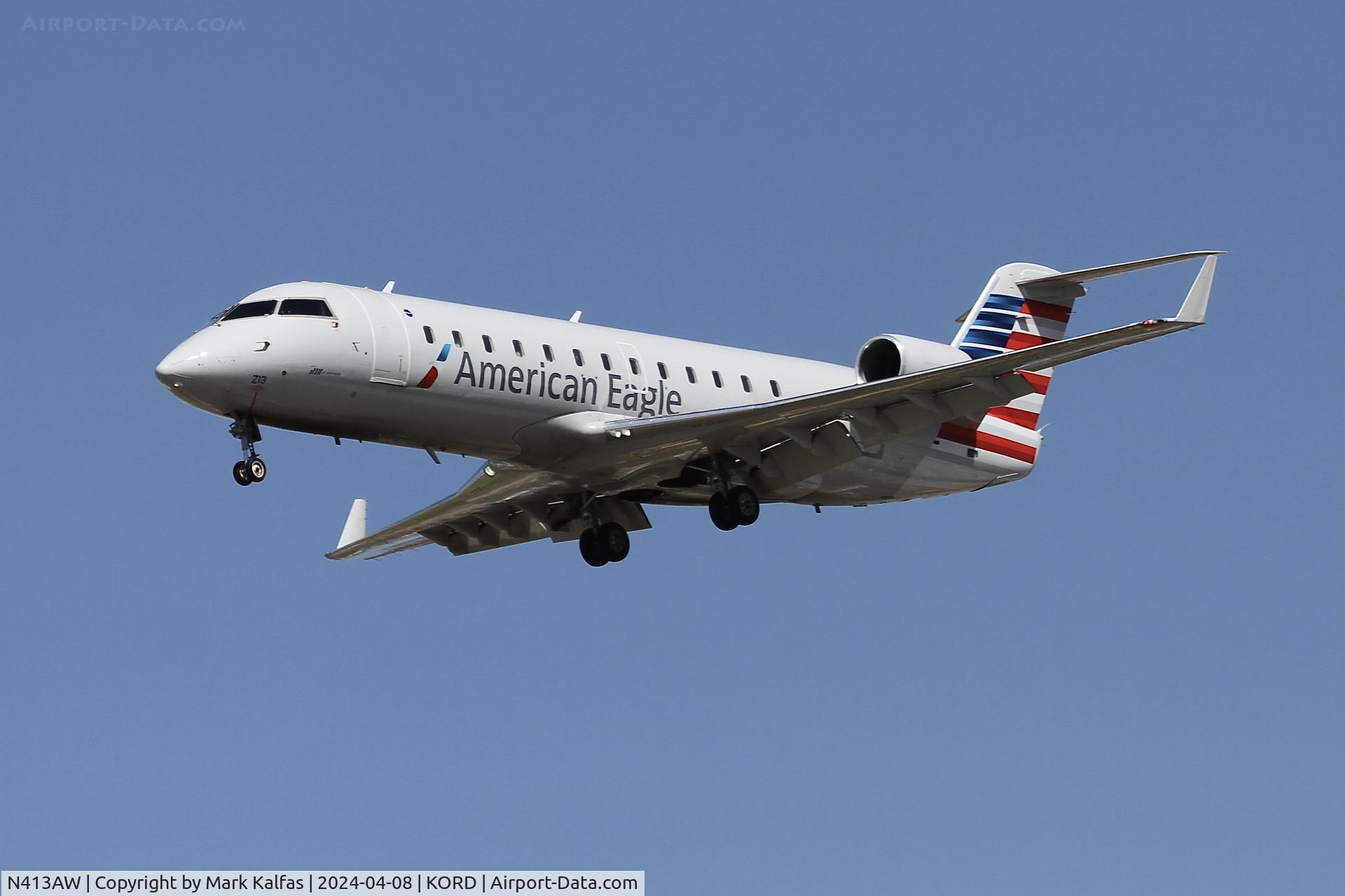N413AW, 2001 Canadair CRJ-200LR (CL-600-2B19) C/N 7585, CRJ2 Air Wisconsin/American Eagle Canadair Regional Jet CRJ-200 N413AW AWI6024 SGF-ORD, 28C approach during the Solar Eclipse