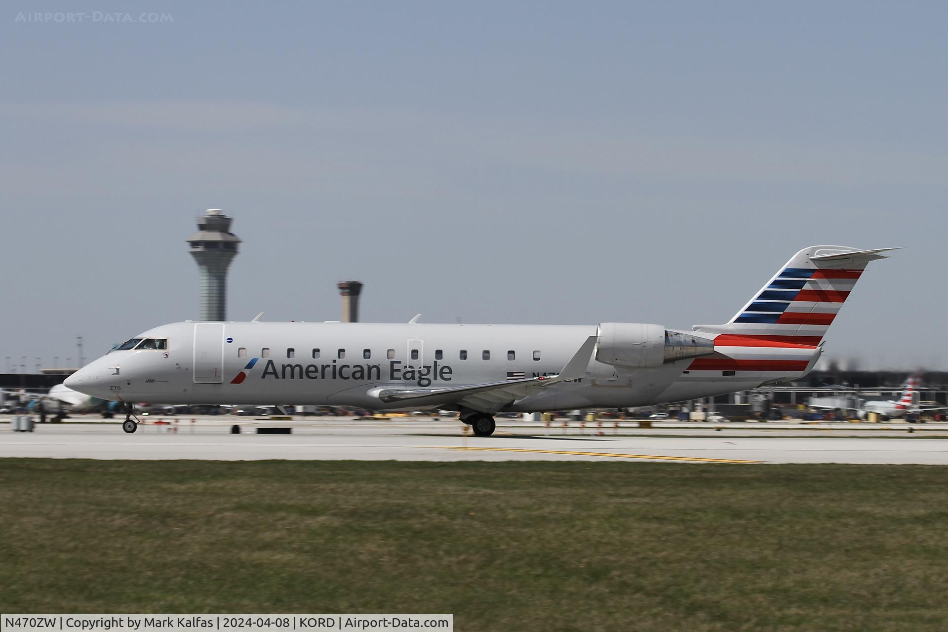N470ZW, 2004 Bombardier CRJ-200LR (CL-600-2B19) C/N 7927, CRJ2 Air Wisconsin/American Eagle Canadair Regional Jet CRJ-200 N470ZW AWI6017 ORD-SPI, departing on 22L ORD during the solar eclipse.