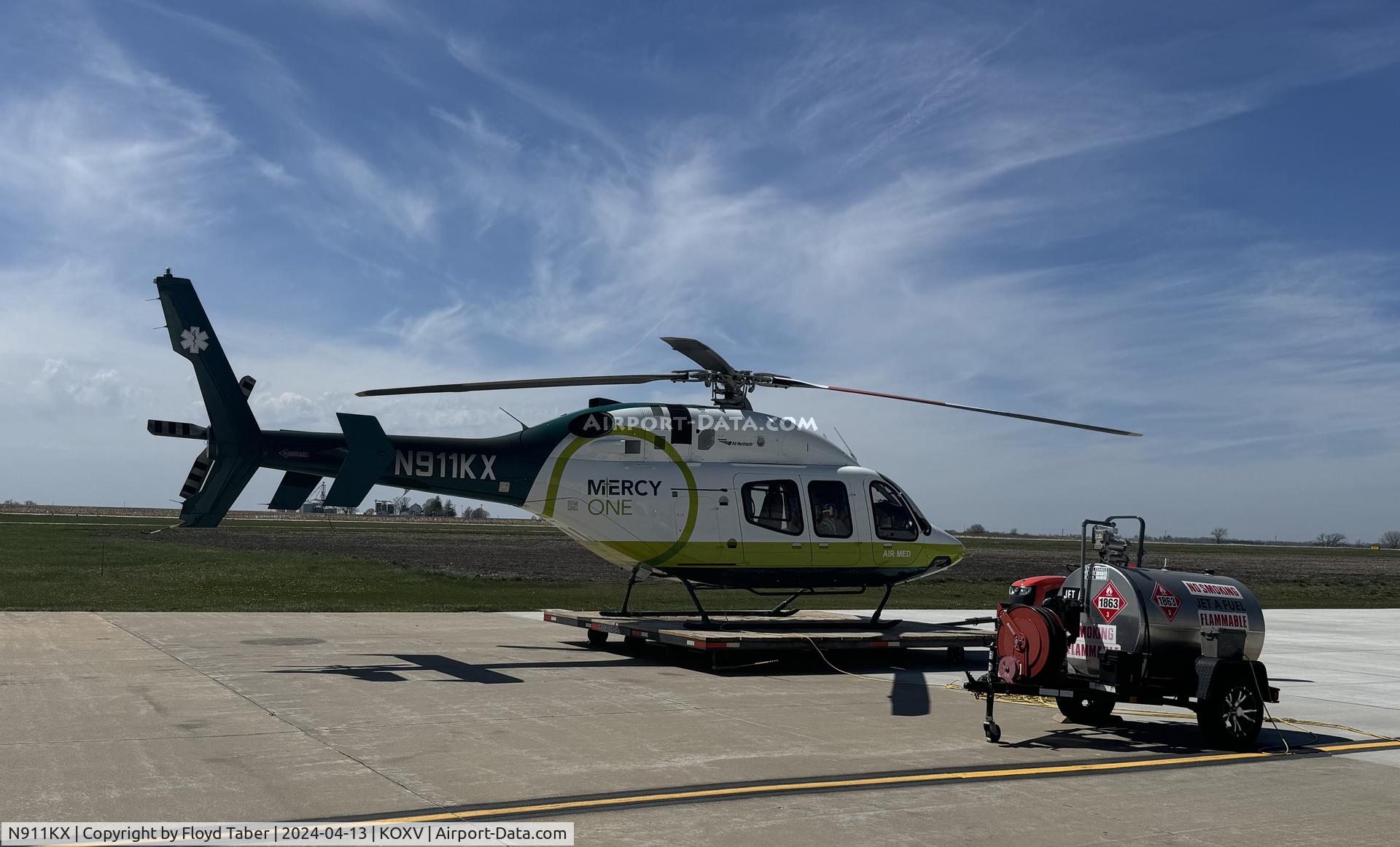 N911KX, 2006 Bell 407 C/N 53719, ON THE RAMP WAITING FOR A CALL