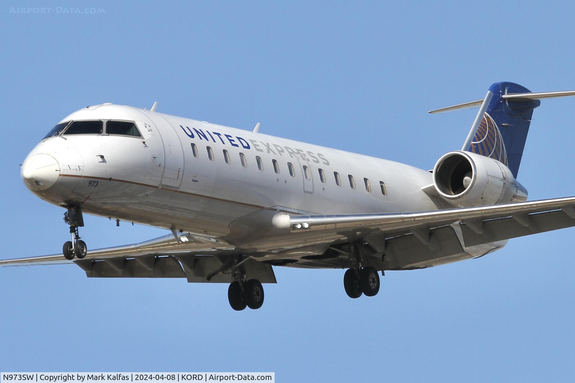 N973SW, 2004 Bombardier CRJ-200ER (CL-600-2B19) C/N 7949, CRJ2 SkyWest/United Express BOMBARDIER INC CL-600-2B19 N973SW SKW4768 LNK-ORD arriving 28C ORD