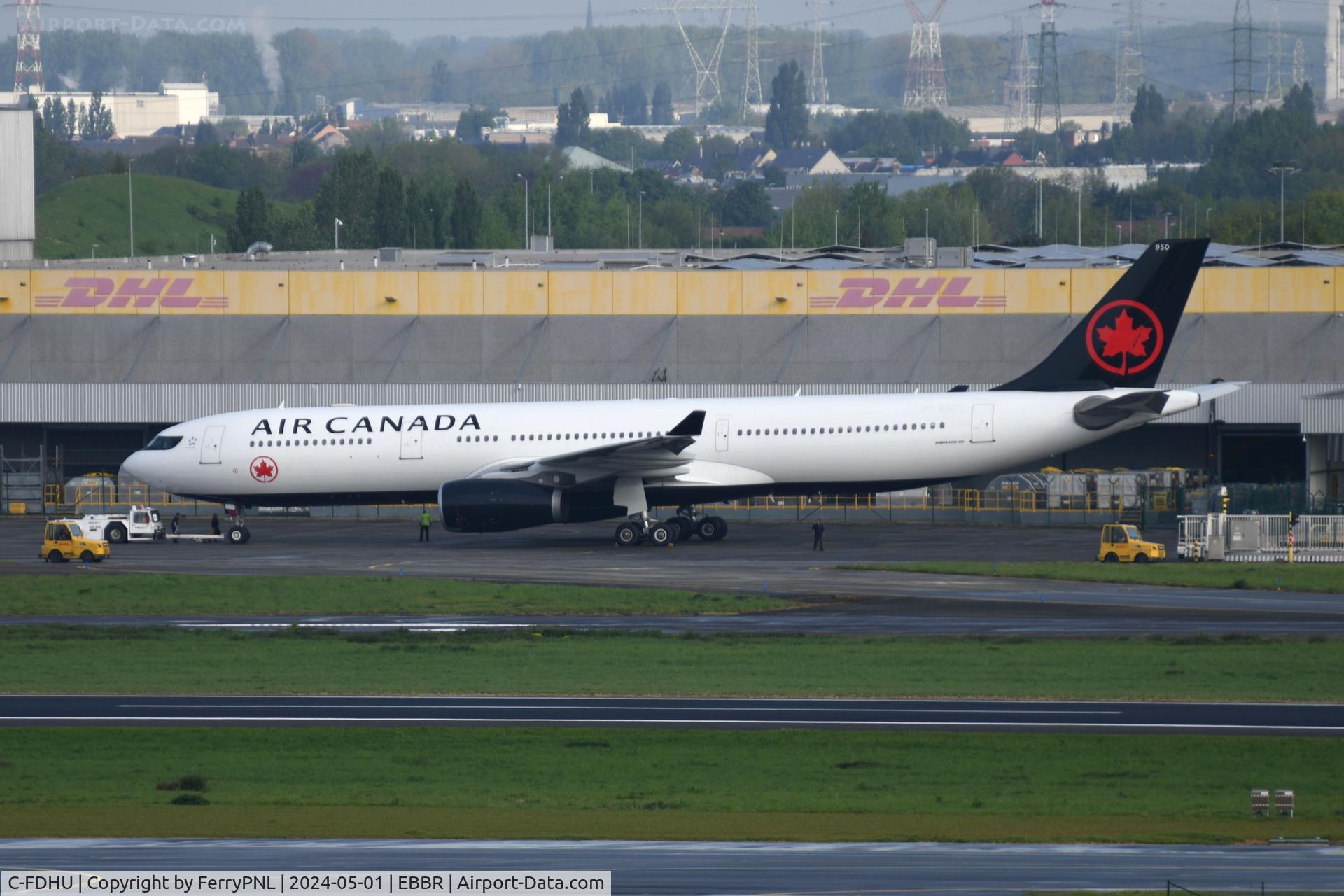 C-FDHU, 2010 Airbus A330-343 C/N 1105, New A333 for Air Canada, in fact it hasn't received a tail number yet. Fleet # 950 on the tail.
