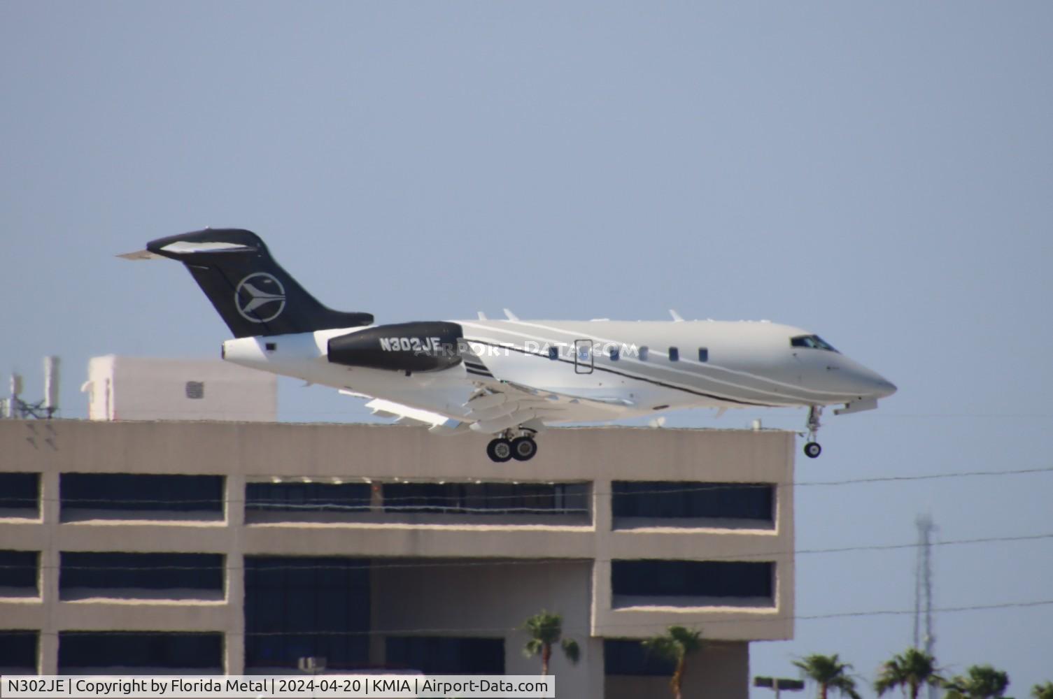 N302JE, 2011 Bombardier Challenger 300 (BD-100-1A10) C/N 20321, Challenger 300 zx TEB-MIA