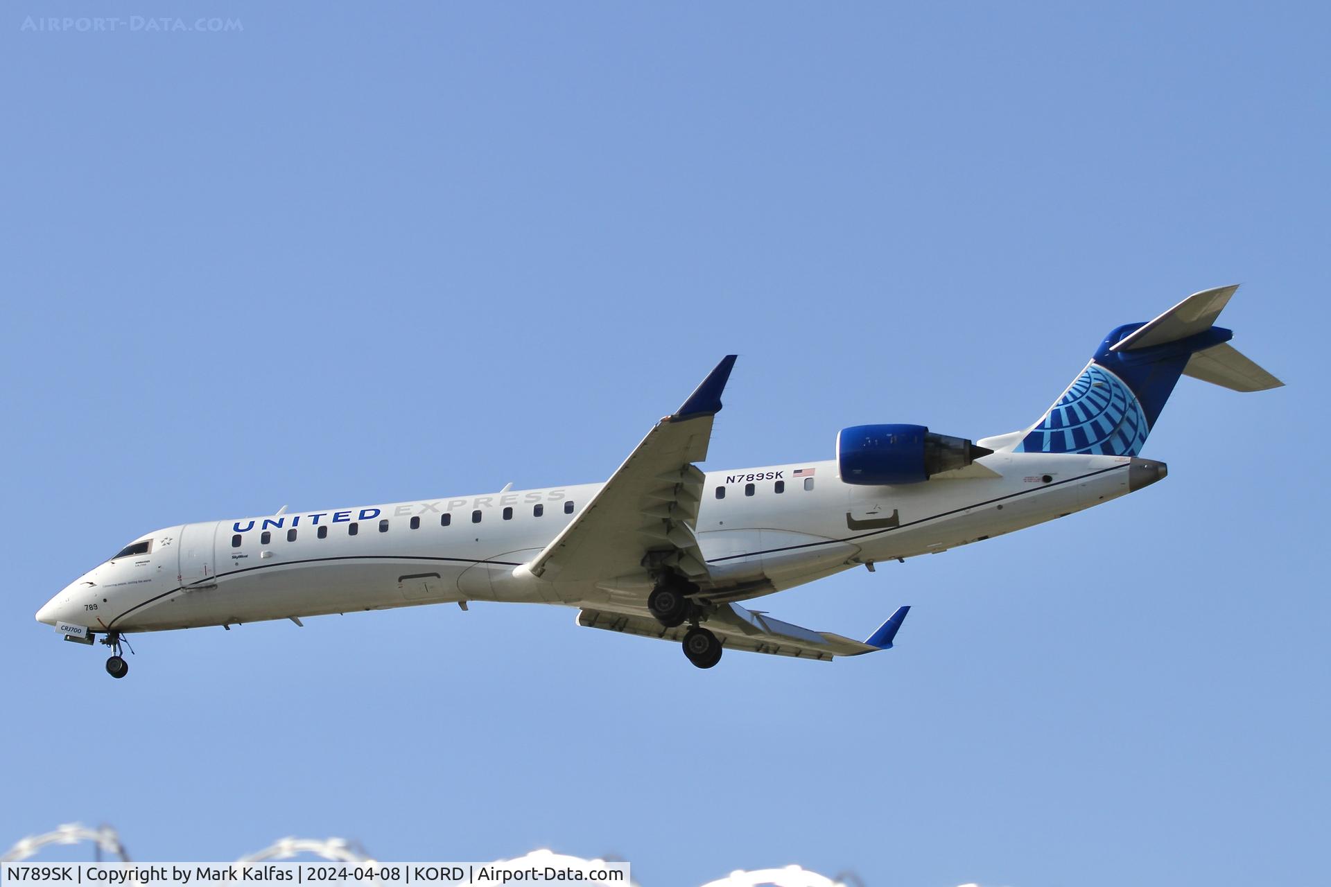 N789SK, 2009 Bombardier CRJ-700 (CL-600-2C10) Regional Jet C/N 10291, CRJ7 SkyWest/United Express Bombardier CRJ-700 (CL-600-2C10) N789SK SKW4651 ASE-ORD arriving on 28C KORD