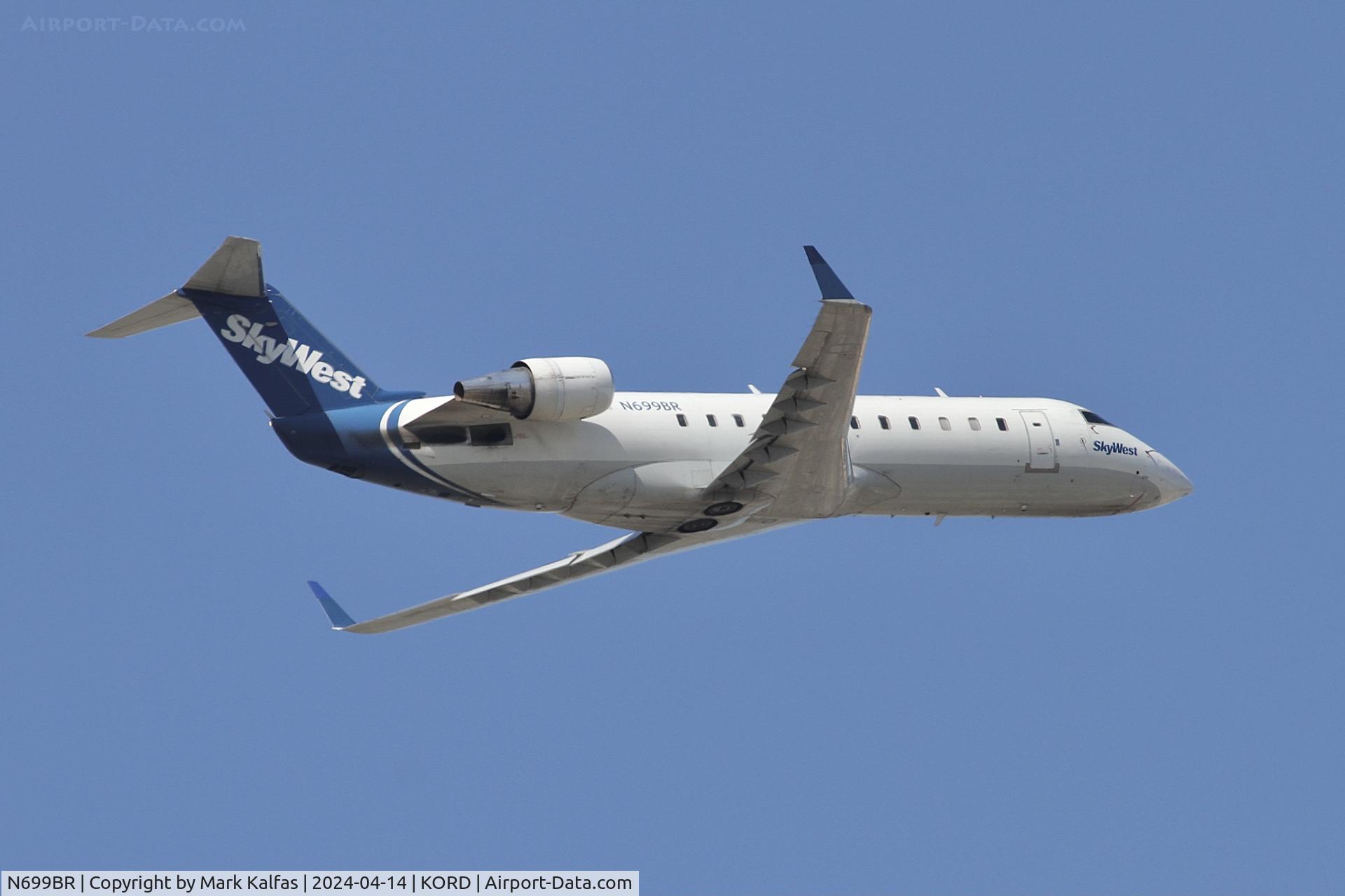 N699BR, 2003 Bombardier CRJ-200ER (CL-600-2B19) C/N 7801, CRJ2 SkyWest .United Express N699BR SKW5060 ORD-DEC departing 10C KORD
