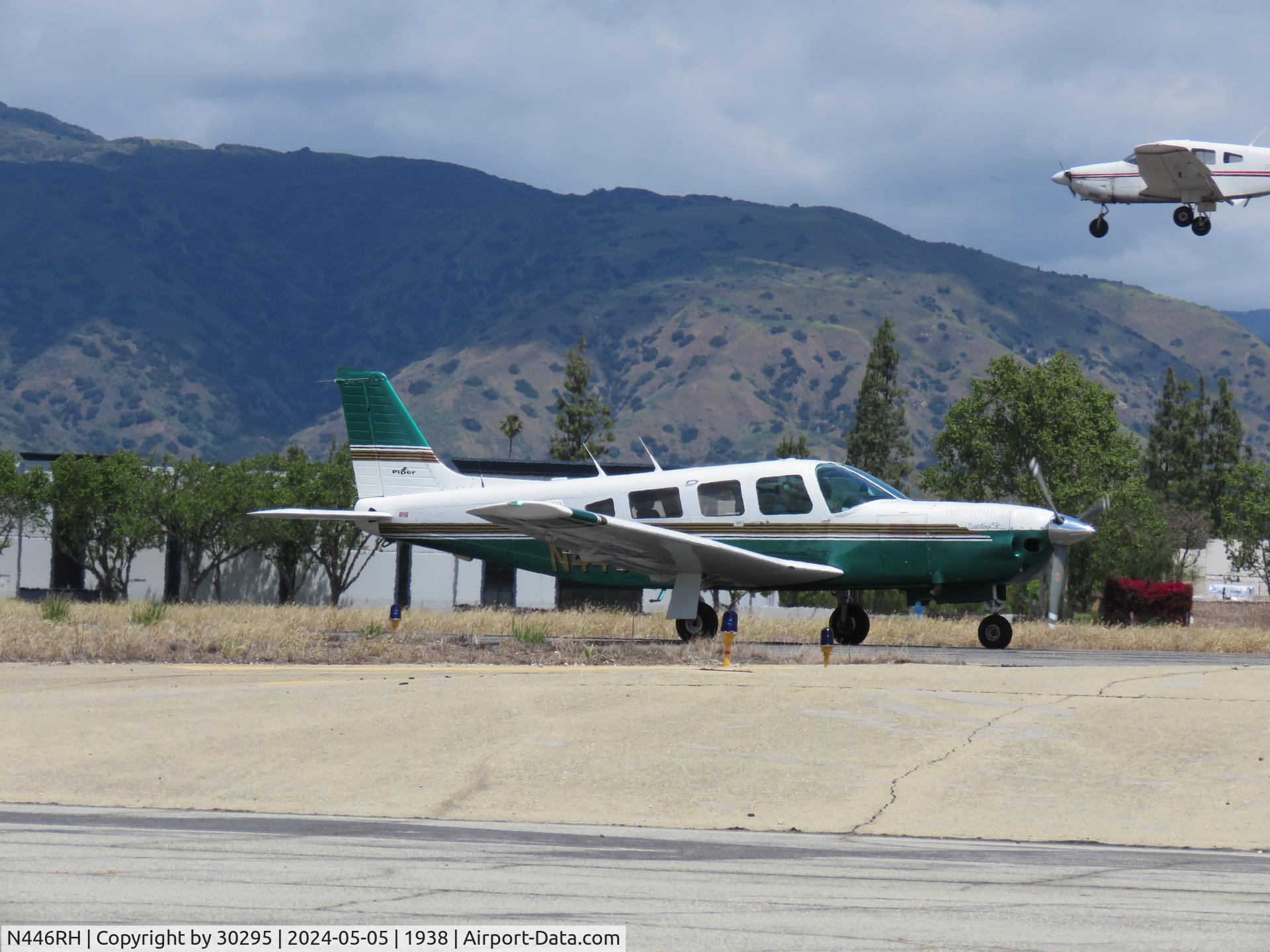 N446RH, 1980 Piper PA-32R-301T Turbo Saratoga C/N 32R-8129025, Taxiing while aircraft landing