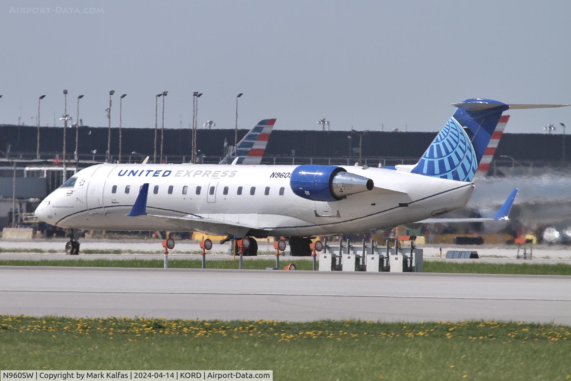 N960SW, 2003 Bombardier CRJ-200ER (CL-600-2B19) C/N 7853, CRJ2 Sky West/ United Express Bombardier 600-2B19 N960SW SKW4793 arriving at ORD from DAY
