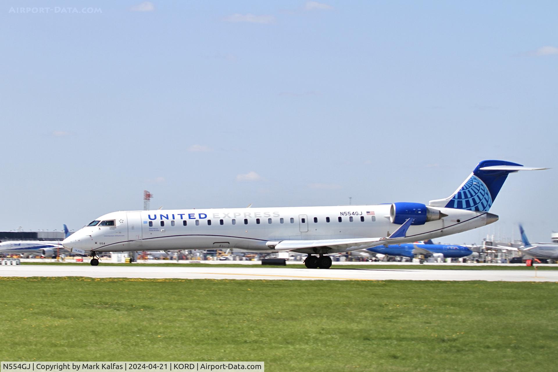 N554GJ, 2009 Bombardier CRJ-702 (CL-600-2C10) C/N 10297, CRJ7 GoJet/United Express Bombardier CRJ-702 (CL-600-2C10) CRJ-550 N554GJ GJS4399  ORD-MEM, departing 22L KORD