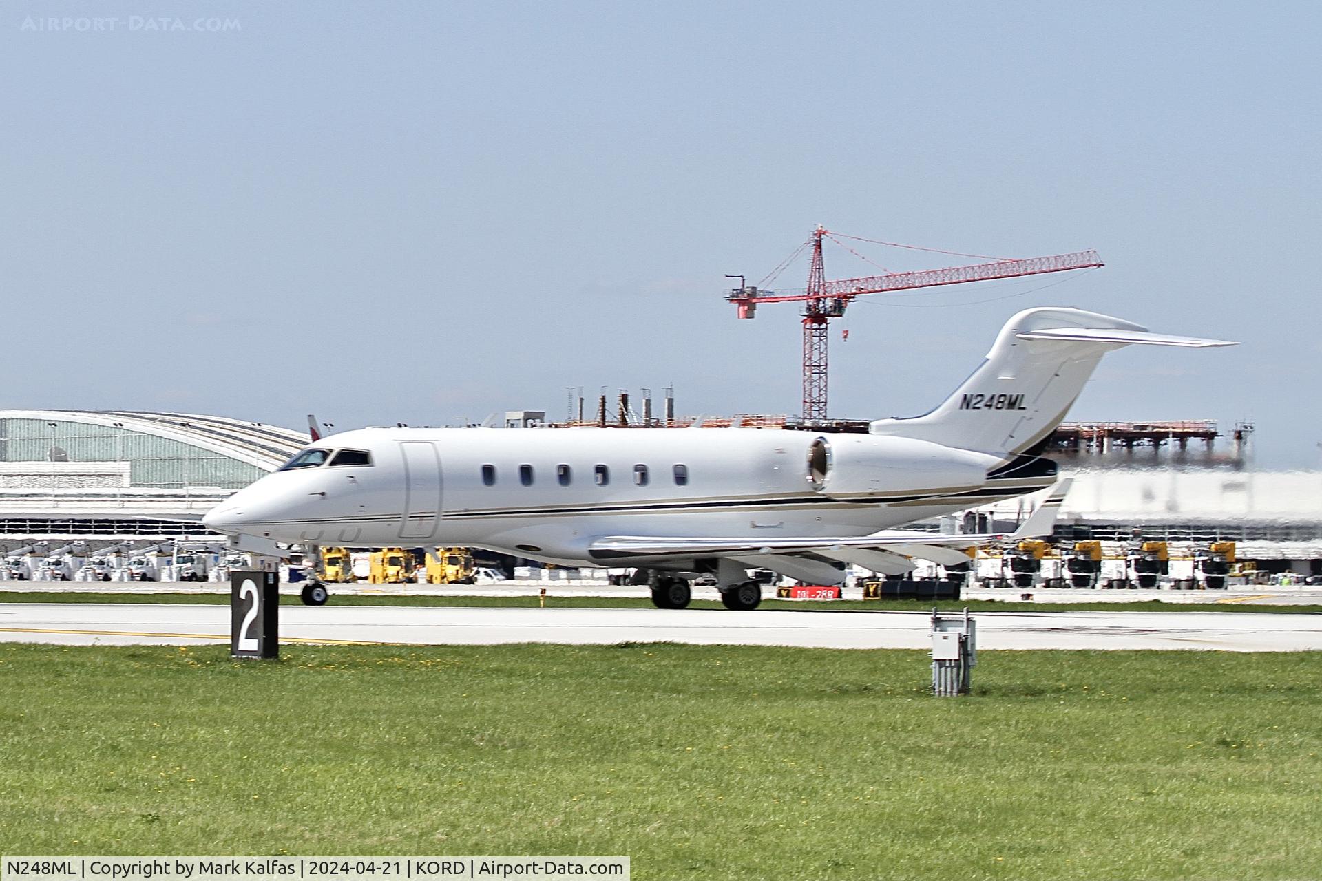 N248ML, 2012 BOMBARDIER INC BD-100-1A10 C/N 20378, CL30 MGLCTT INC BOMBARDIER INC BD-100-1A10 Challenger 300, N248ML departing 22L KORD