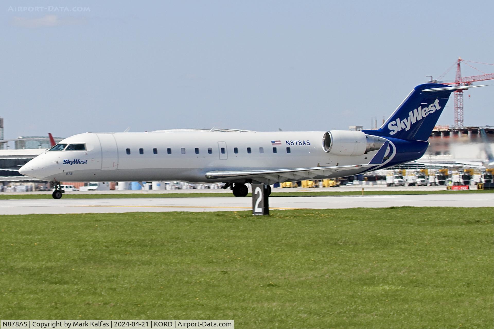 N878AS, 2002 Bombardier CRJ-200ER (CL-600-2B19) C/N 7590, CRJ2 SkyWest/United Express Bombardier CRJ-200ER (CL-600-2B19)  N878AS SKW5443 ORD-SDF departing 22L KORD