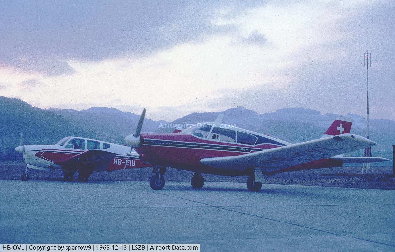 HB-OVL, 1962 Piper PA-24-250 Comanche C/N 24-3347, A cloudy winter day at Bern-Belp. Scanned from a slide.