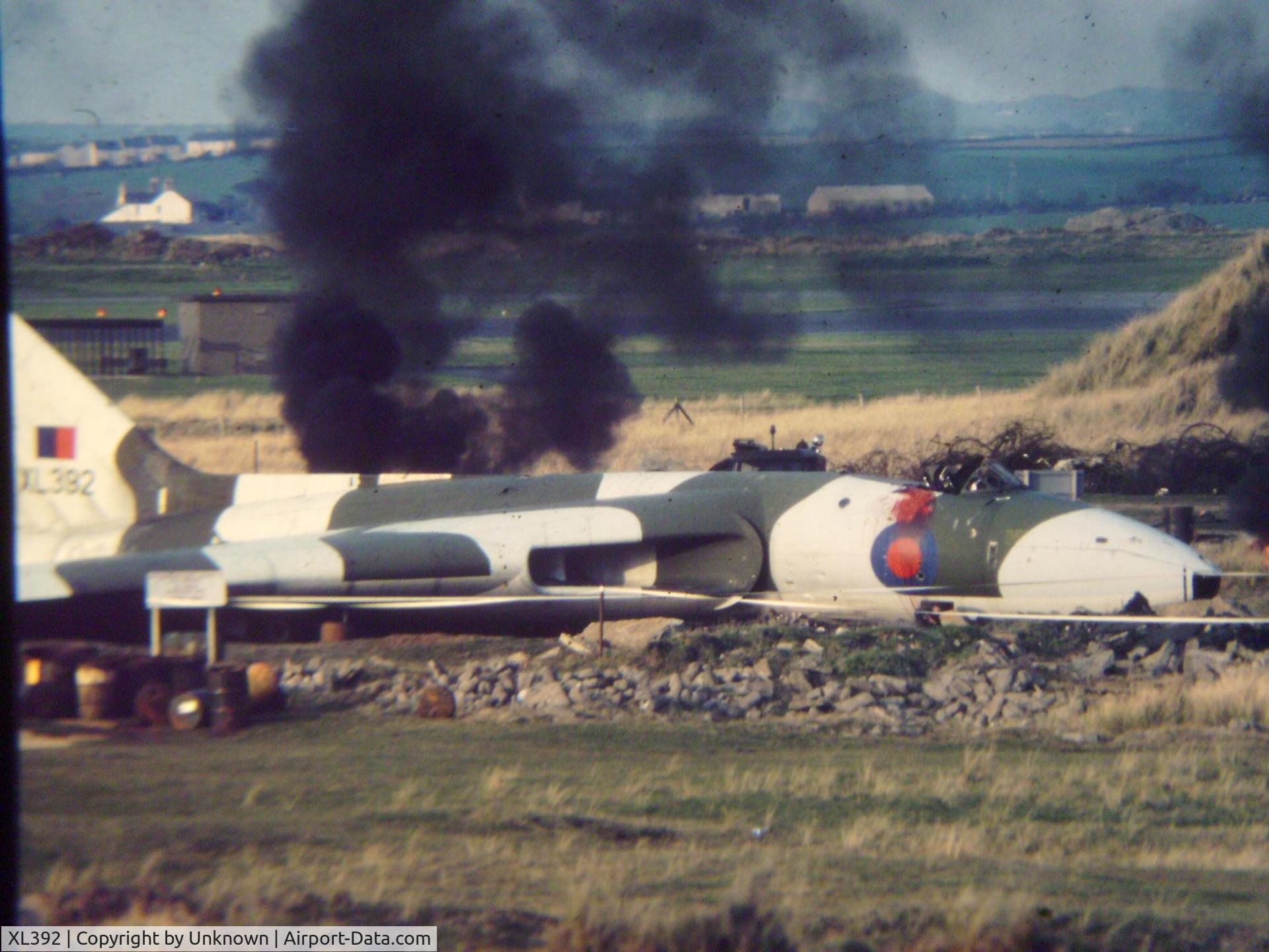 XL392, 1962 Avro Vulcan B.2 C/N Set 42, Avro Vulcan XL 393 at rest in the aircraft fire practice area at RAF Valley on Angelsey
