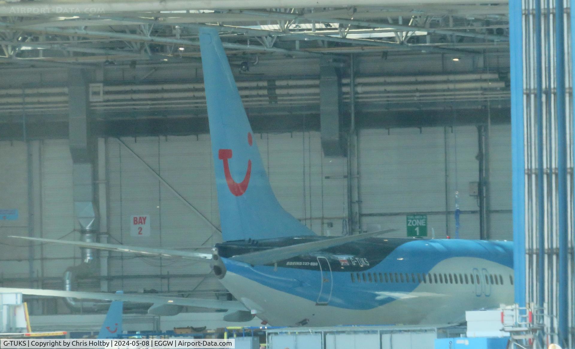 G-TUKS, 2008 Boeing 737-8K2 C/N 29650, In the maintenance hangar at Luton Airport