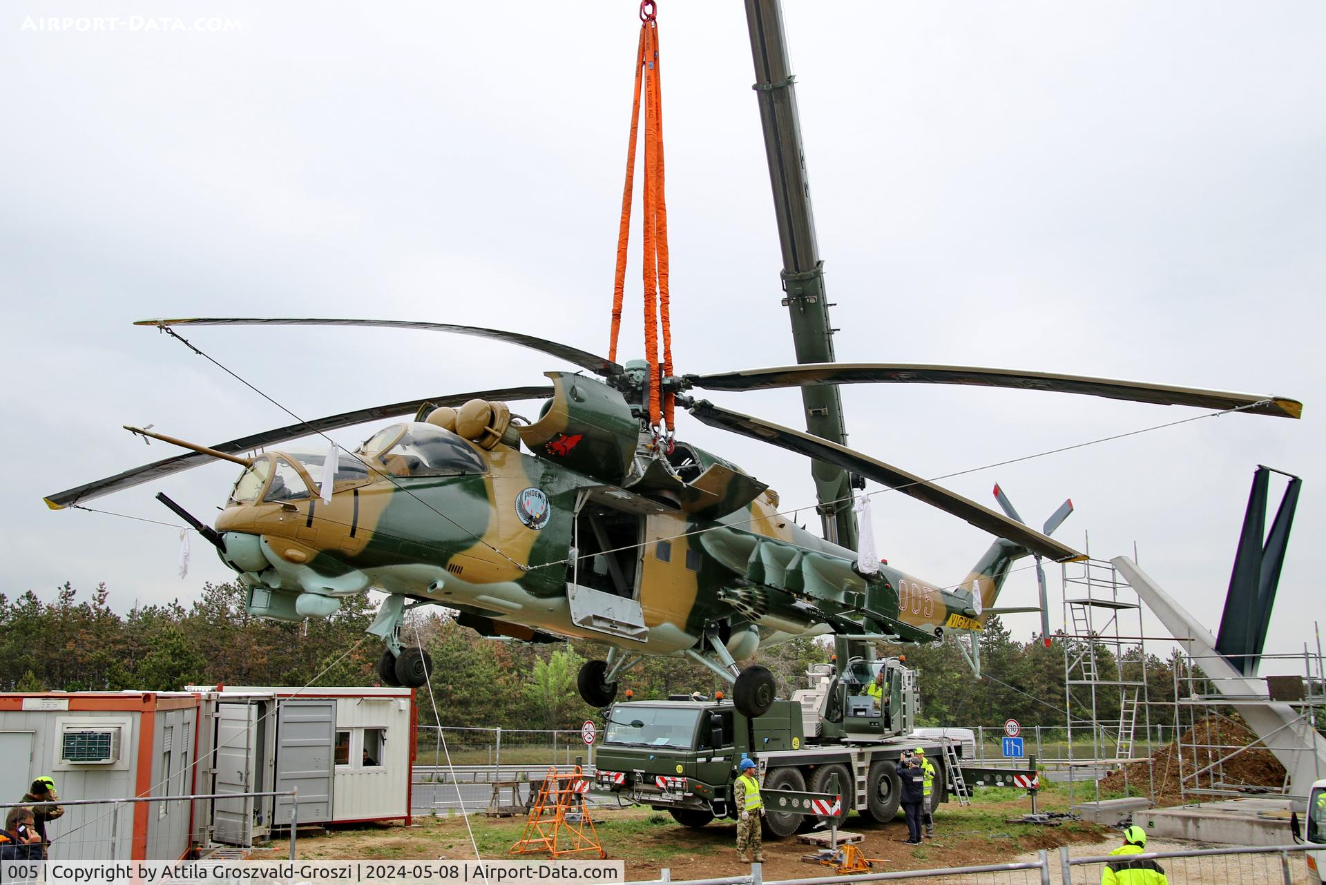 005, 1983 Mil Mi-24D Hind C/N 340275, Displayed as a memorial on the road leading to the former Szentkirályszabadjai Airport. It was given page number 005 in memory of the first Mi-24 combat helicopter to arrive in Hungary. Installation moments.