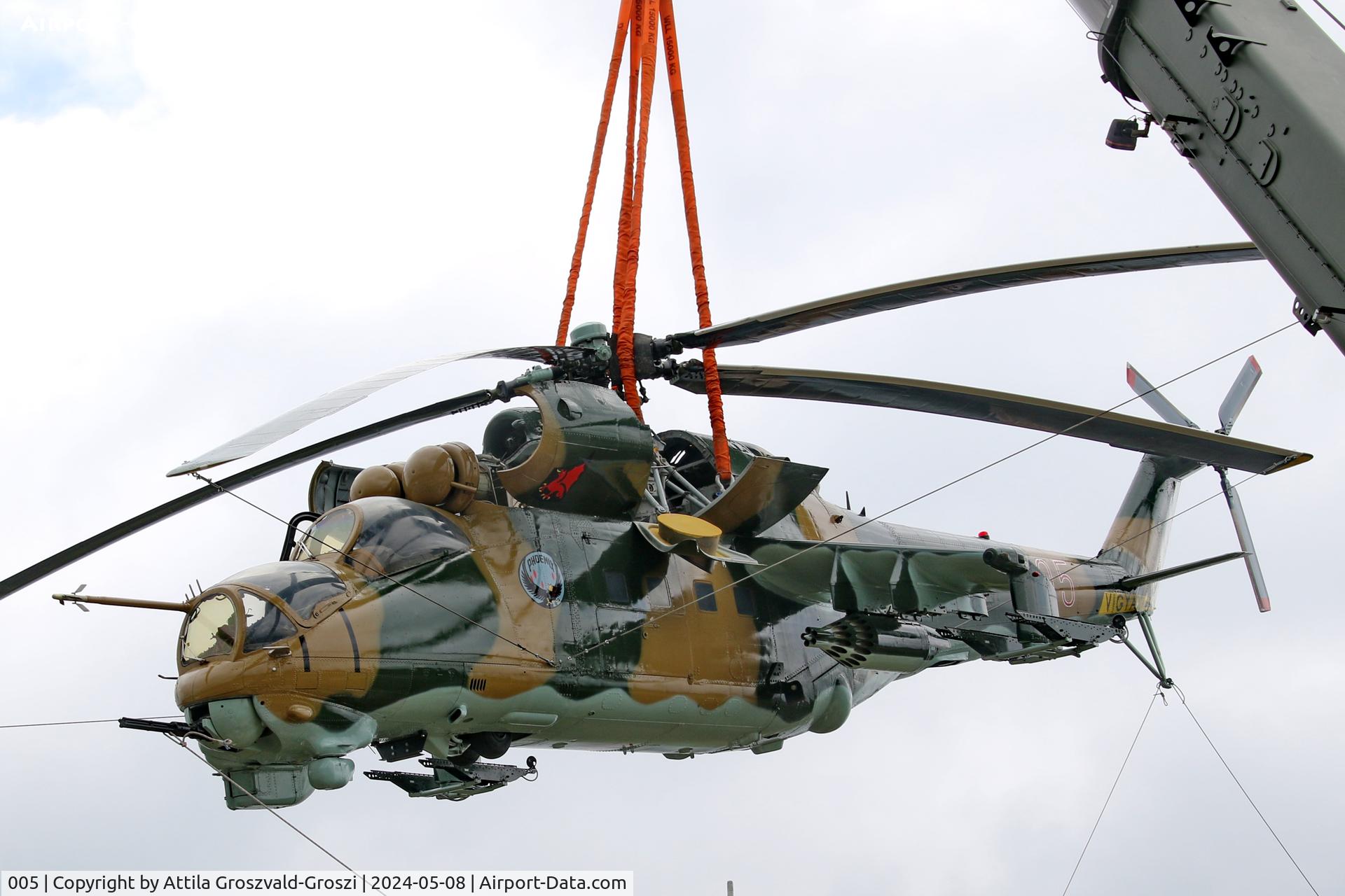 005, 1983 Mil Mi-24D Hind C/N 340275, Displayed as a memorial on the road leading to the former Szentkirályszabadjai Airport. It was given page number 005 in memory of the first Mi-24 combat helicopter to arrive in Hungary. Installation moments.