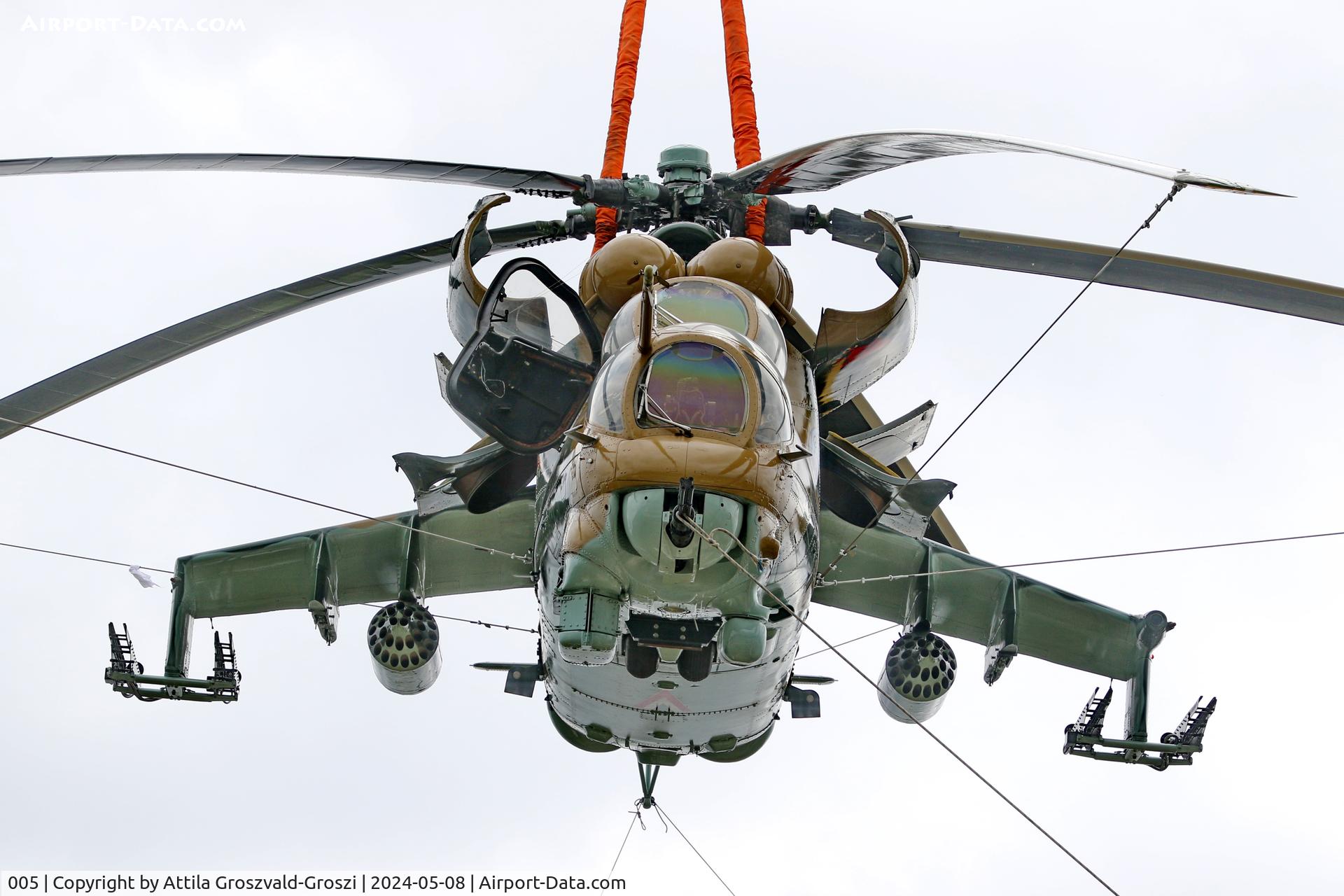 005, 1983 Mil Mi-24D Hind C/N 340275, Displayed as a memorial on the road leading to the former Szentkirályszabadjai Airport. It was given page number 005 in memory of the first Mi-24 combat helicopter to arrive in Hungary. Installation moments.