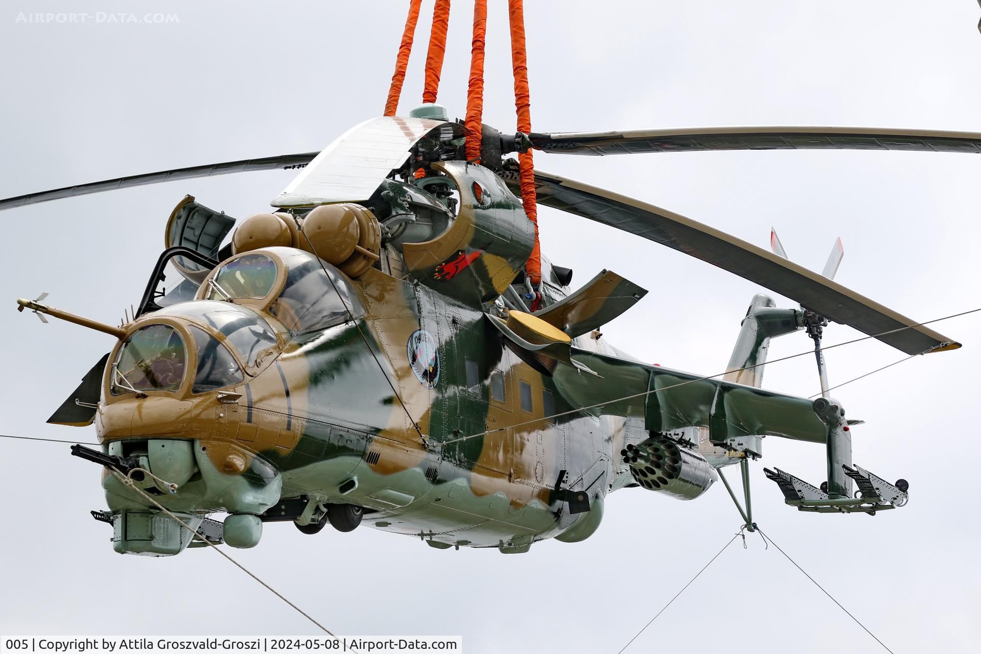 005, 1983 Mil Mi-24D Hind C/N 340275, Displayed as a memorial on the road leading to the former Szentkirályszabadjai Airport. It was given page number 005 in memory of the first Mi-24 combat helicopter to arrive in Hungary. Installation moments.