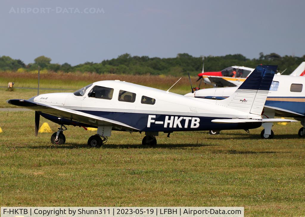 F-HKTB, 2001 Piper PA-28-181 Cherokee Archer III C/N 2843496, Parked in the grass...