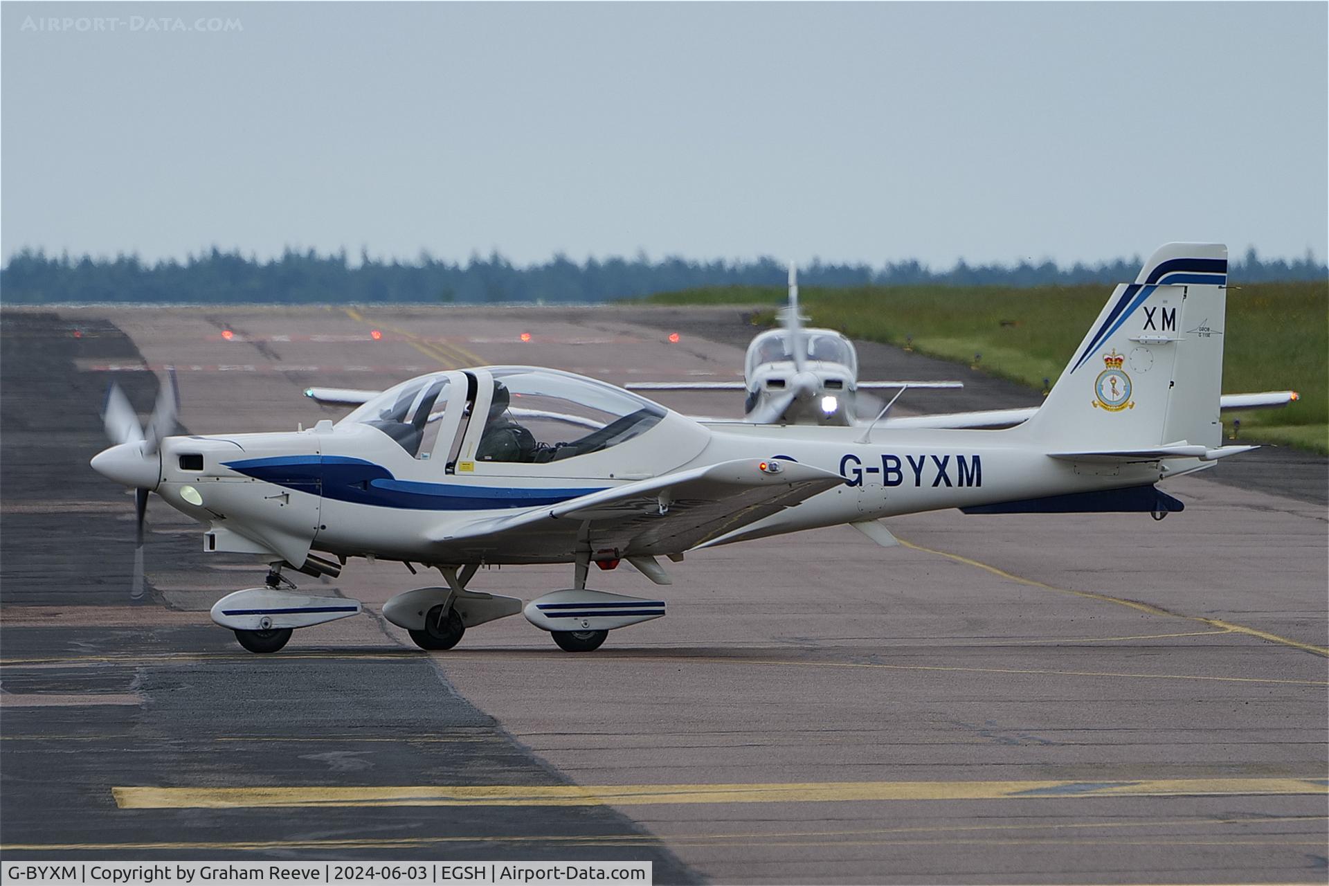 G-BYXM, 2001 Grob G-115E Tutor T1 C/N 82173/E, Just landed at Norwich.
