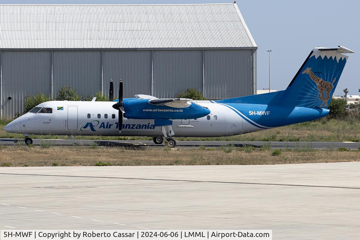 5H-MWF, 1997 De Havilland Canada DHC-8-311 Dash 8 C/N 474, Bravo
