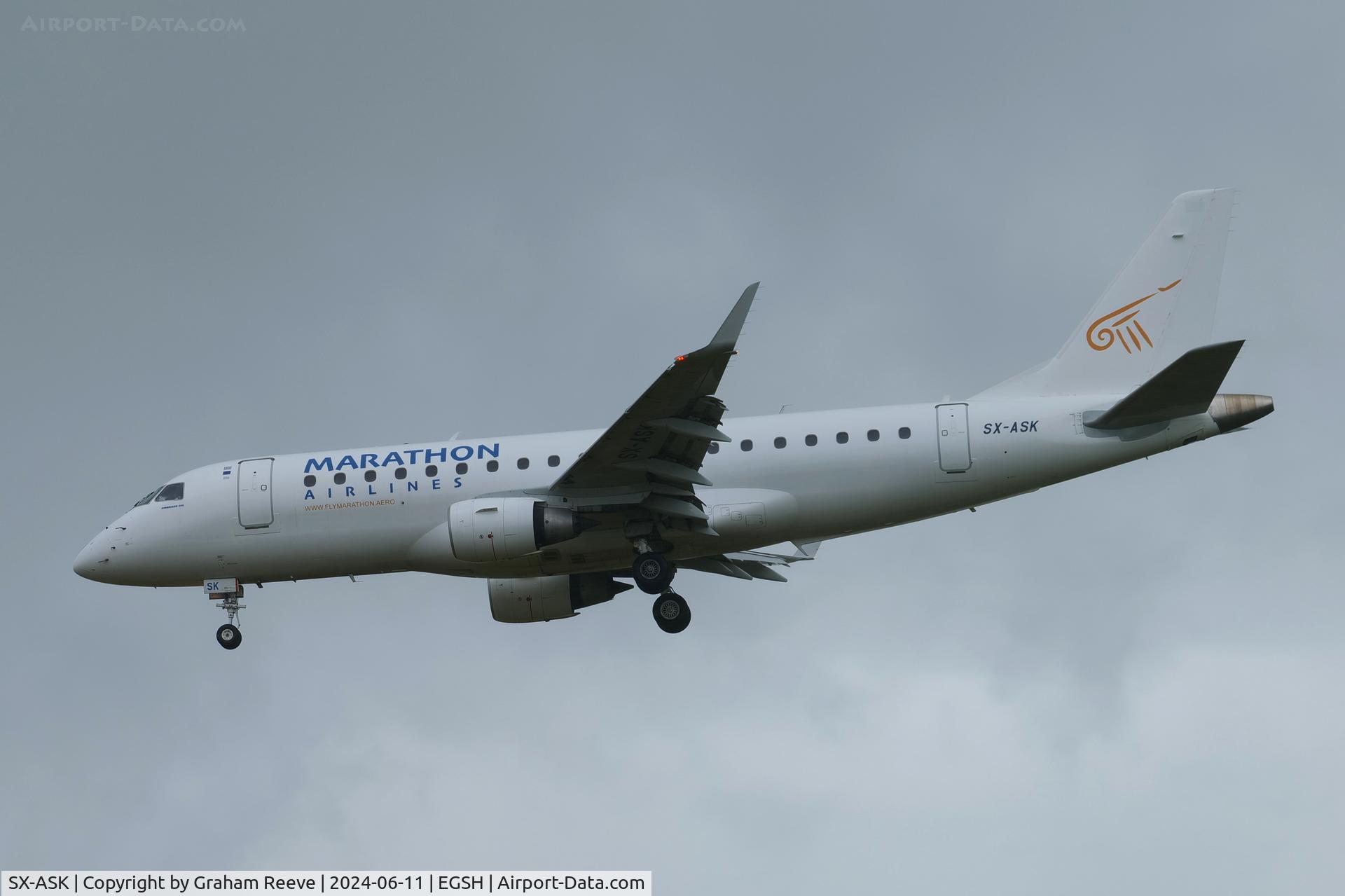 SX-ASK, Embraer E175STD C/N 17000330, Landing at Norwich in heavy rain..