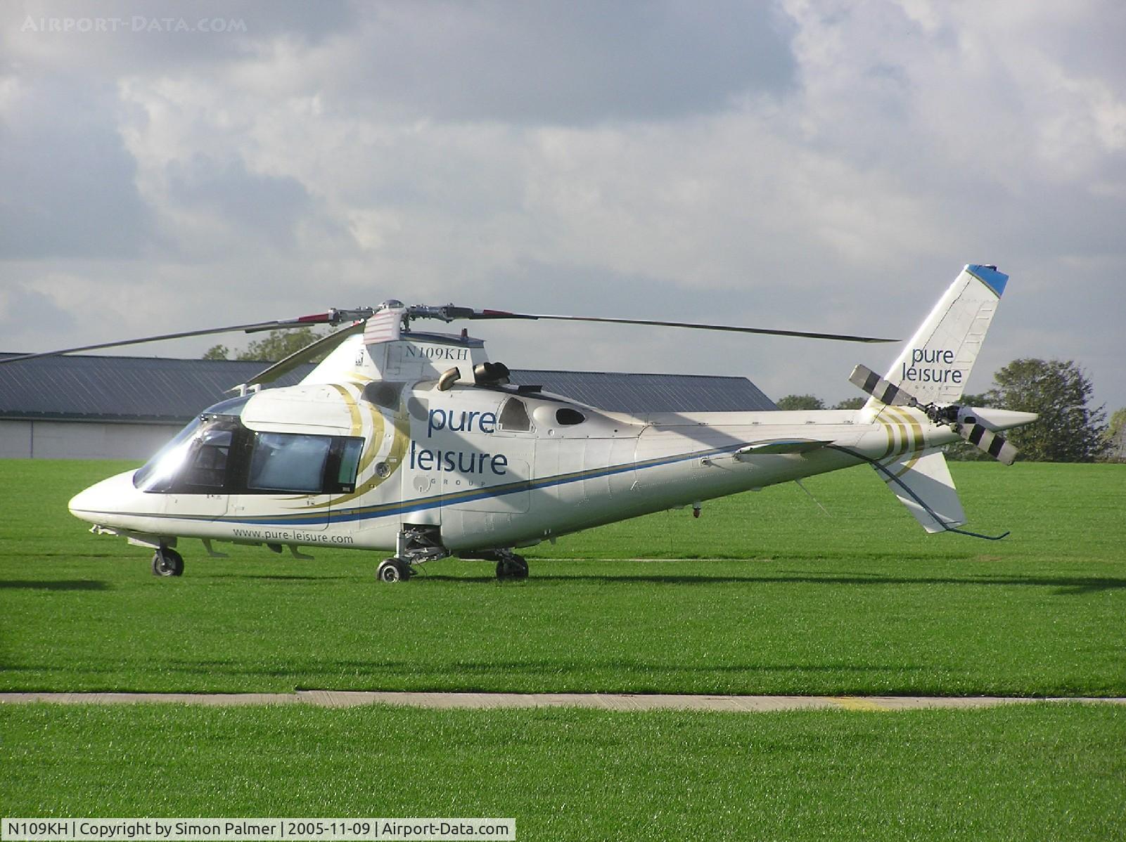 N109KH, 1990 Agusta A-109C C/N 7609, Agusta 109 sitting in the sunshine at Sywell