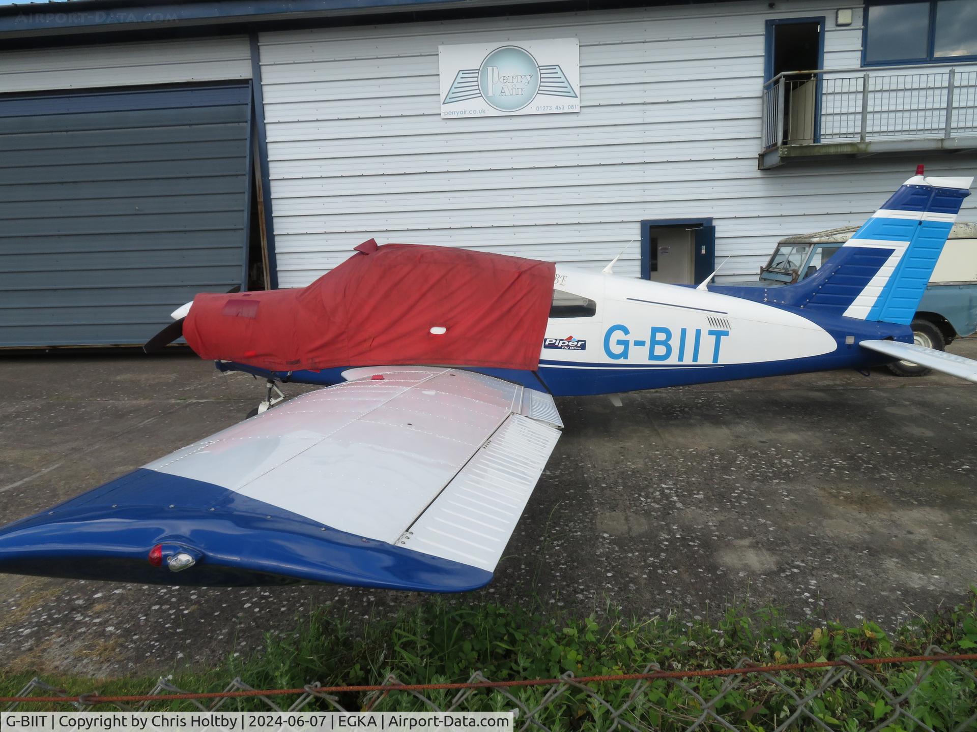 G-BIIT, 1980 Piper PA-28-161 Cherokee Warrior II C/N 28-8116052, Parked at Shoreham outside the Perry Aviation hangar