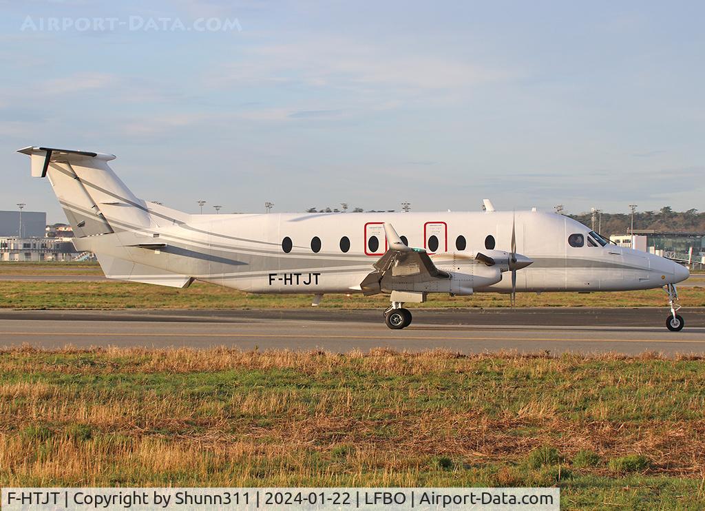 F-HTJT, 1997 Beech 1900D C/N UE-288, Taxiing holding point rwy 14L for departure... Swiss Air Force basic c/s