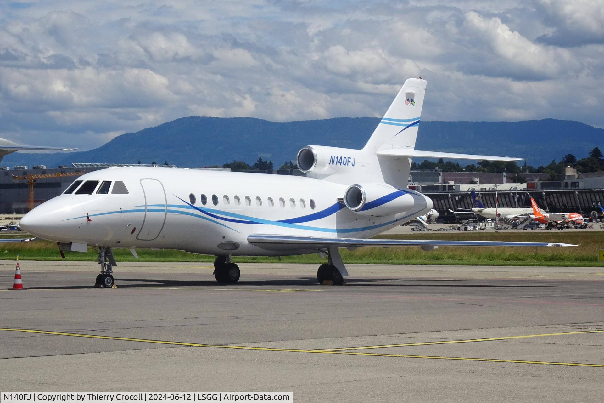 N140FJ, 1995 Dassault Falcon 900B C/N 140, Parked on the north apron at Geneva Airport.